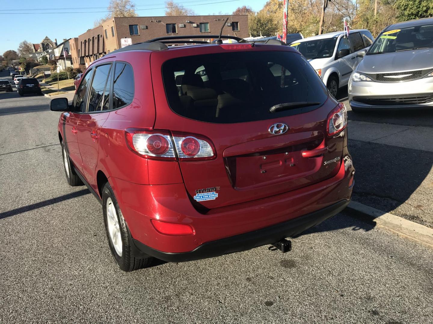 2011 Red /Tan Hyundai Santa Fe GLS 2.4 (5XYZG3AB8BG) with an 2.4L L4 DOHC 16V engine, 6-Speed Automatic transmission, located at 577 Chester Pike, Prospect Park, PA, 19076, (610) 237-1015, 39.886154, -75.302338 - Photo#4
