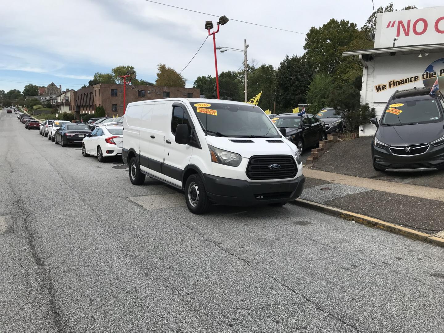 2016 White /Gray Ford Transit 150 Van Low Roof 60/40 Pass. 130-in. WB (1FTYE1ZM7GK) with an 3.7L V6 DOHC 24V engine, 6A transmission, located at 577 Chester Pike, Prospect Park, PA, 19076, (610) 237-1015, 39.886154, -75.302338 - 2016 Ford Transit 150 Low Roof: Fleet maintained, new PA inspection, backup camera, no rear windows, runs EXCELLENT! This vehicle comes inspected and has been given a bumper to bumper safety check. It is very clean, reliable, and well maintained. We offer a unique pay plan that is known for being- Photo#1