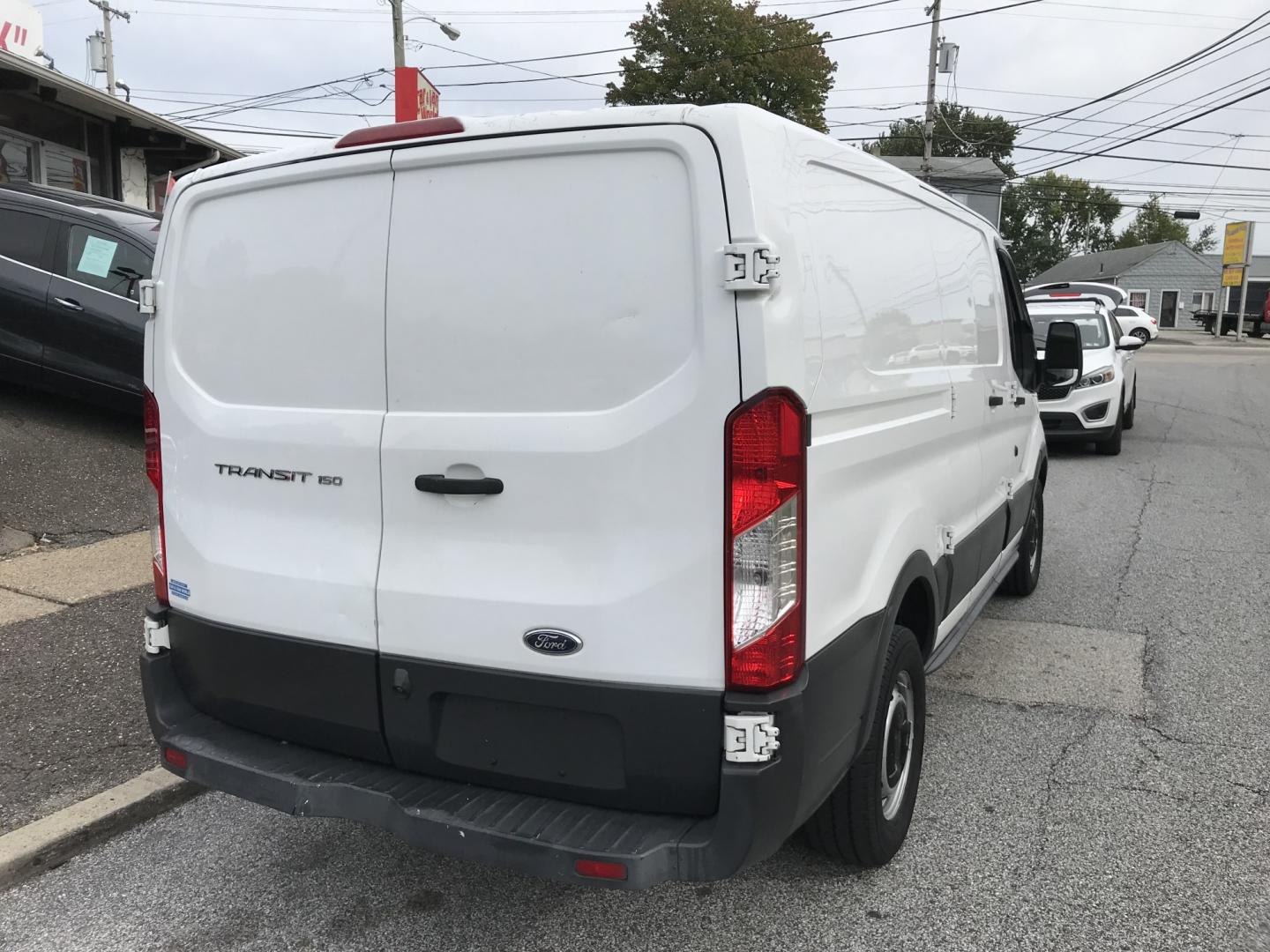 2016 White /Gray Ford Transit 150 Van Low Roof 60/40 Pass. 130-in. WB (1FTYE1ZM7GK) with an 3.7L V6 DOHC 24V engine, 6A transmission, located at 577 Chester Pike, Prospect Park, PA, 19076, (610) 237-1015, 39.886154, -75.302338 - 2016 Ford Transit 150 Low Roof: Fleet maintained, new PA inspection, backup camera, no rear windows, runs EXCELLENT! This vehicle comes inspected and has been given a bumper to bumper safety check. It is very clean, reliable, and well maintained. We offer a unique pay plan that is known for being- Photo#5