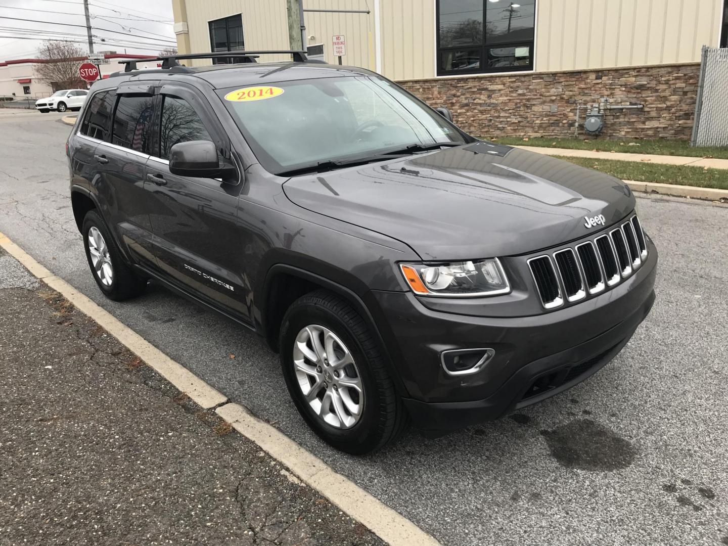 2014 Gray /Gray Jeep Grand Cherokee Laredo 4WD (1C4RJFAG1EC) with an 3.6L V6 DOHC 24V engine, 5-Speed Automatic transmission, located at 577 Chester Pike, Prospect Park, PA, 19076, (610) 237-1015, 39.886154, -75.302338 - 2014 Jeep Cherokee Laredo: 4x4, navigation system, new PA inspection, SUPER CLEAN, runs LIKE NEW! This vehicle comes inspected and has been given a bumper to bumper safety check. It is very clean, reliable, and well maintained. We offer a unique pay plan that is known for being the easiest and fa - Photo#3