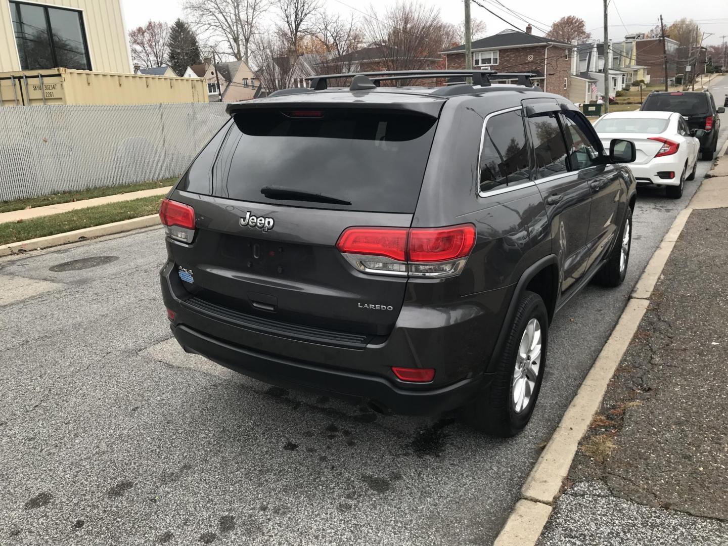 2014 Gray /Gray Jeep Grand Cherokee Laredo 4WD (1C4RJFAG1EC) with an 3.6L V6 DOHC 24V engine, 5-Speed Automatic transmission, located at 577 Chester Pike, Prospect Park, PA, 19076, (610) 237-1015, 39.886154, -75.302338 - 2014 Jeep Cherokee Laredo: 4x4, navigation system, new PA inspection, SUPER CLEAN, runs LIKE NEW! This vehicle comes inspected and has been given a bumper to bumper safety check. It is very clean, reliable, and well maintained. We offer a unique pay plan that is known for being the easiest and fa - Photo#5