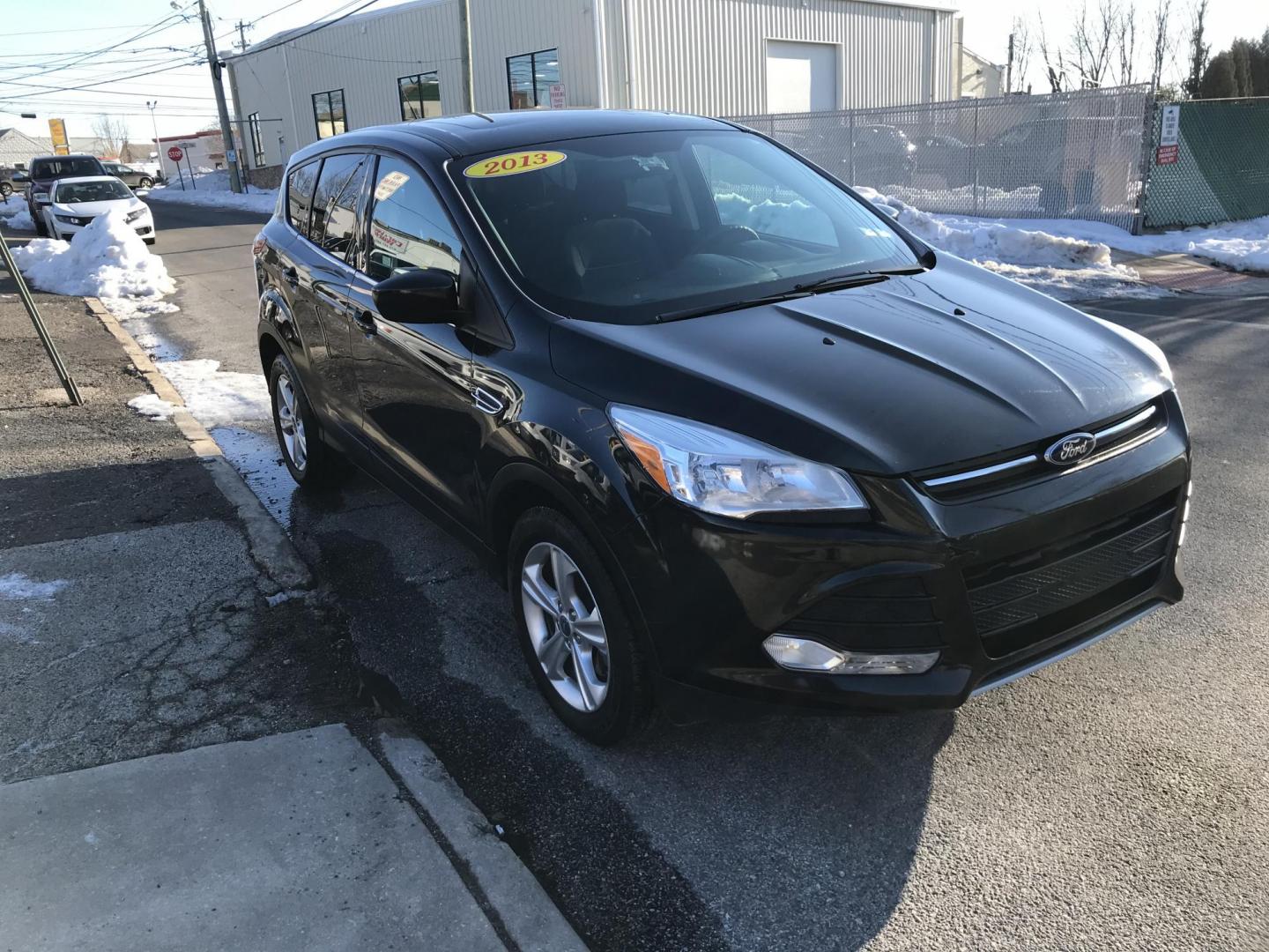 2013 Black /Gray Ford Escape SE (1FMCU0G99DU) with an 2.0L L4 DOHC 16V engine, 6-Speed Automatic transmission, located at 577 Chester Pike, Prospect Park, PA, 19076, (610) 237-1015, 39.886154, -75.302338 - 2013 Ford Escape SE: Only 98k miles, sunroof, great on gas, new PA inspection, runs excellent, SUPER CLEAN! This vehicle comes inspected and has been given a bumper to bumper safety check. It is very clean, reliable, and well maintained. We offer a unique pay plan that is known for being the easi - Photo#3