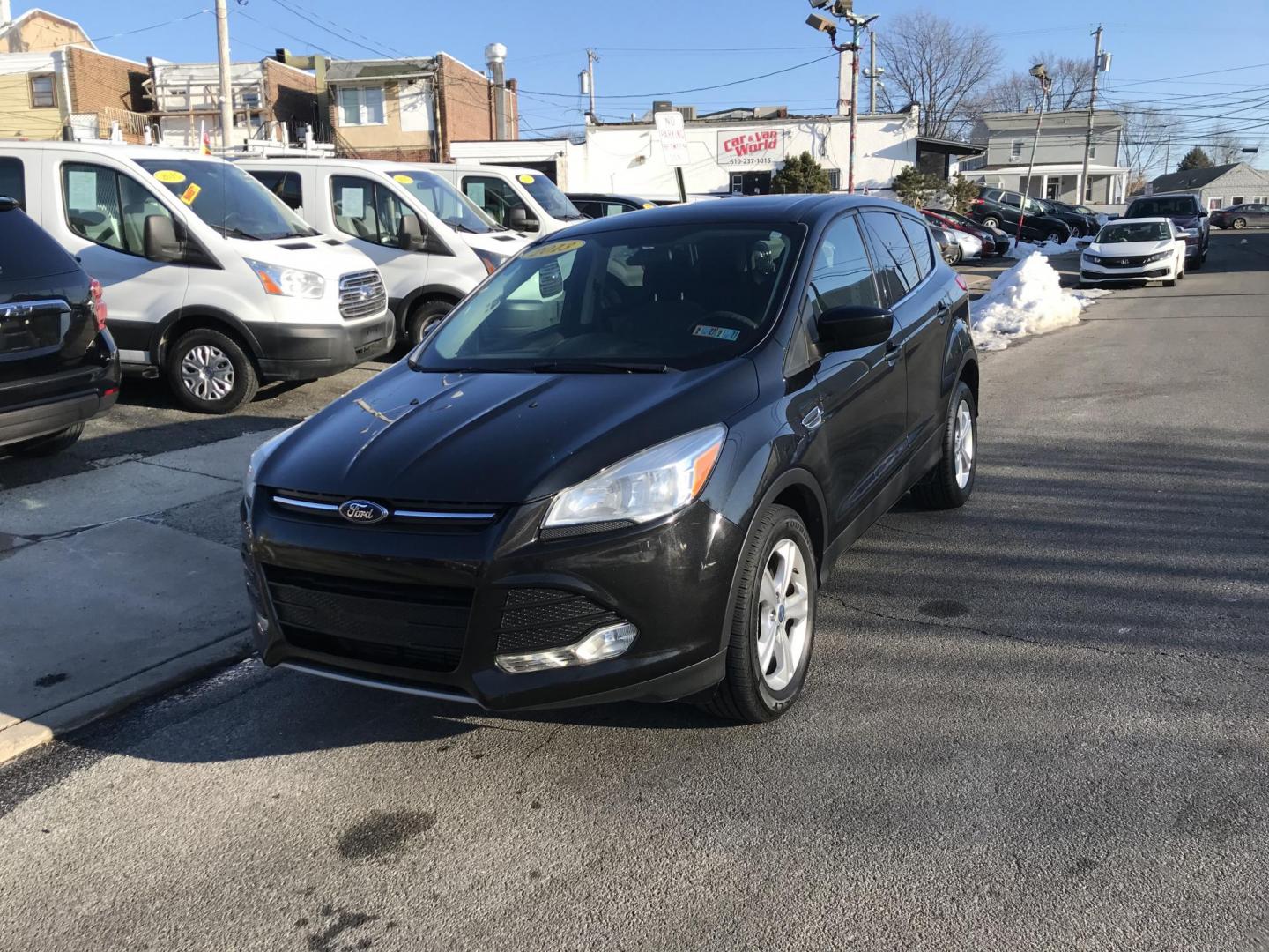 2013 Black /Gray Ford Escape SE (1FMCU0G99DU) with an 2.0L L4 DOHC 16V engine, 6-Speed Automatic transmission, located at 577 Chester Pike, Prospect Park, PA, 19076, (610) 237-1015, 39.886154, -75.302338 - 2013 Ford Escape SE: Only 98k miles, sunroof, great on gas, new PA inspection, runs excellent, SUPER CLEAN! This vehicle comes inspected and has been given a bumper to bumper safety check. It is very clean, reliable, and well maintained. We offer a unique pay plan that is known for being the easi - Photo#2
