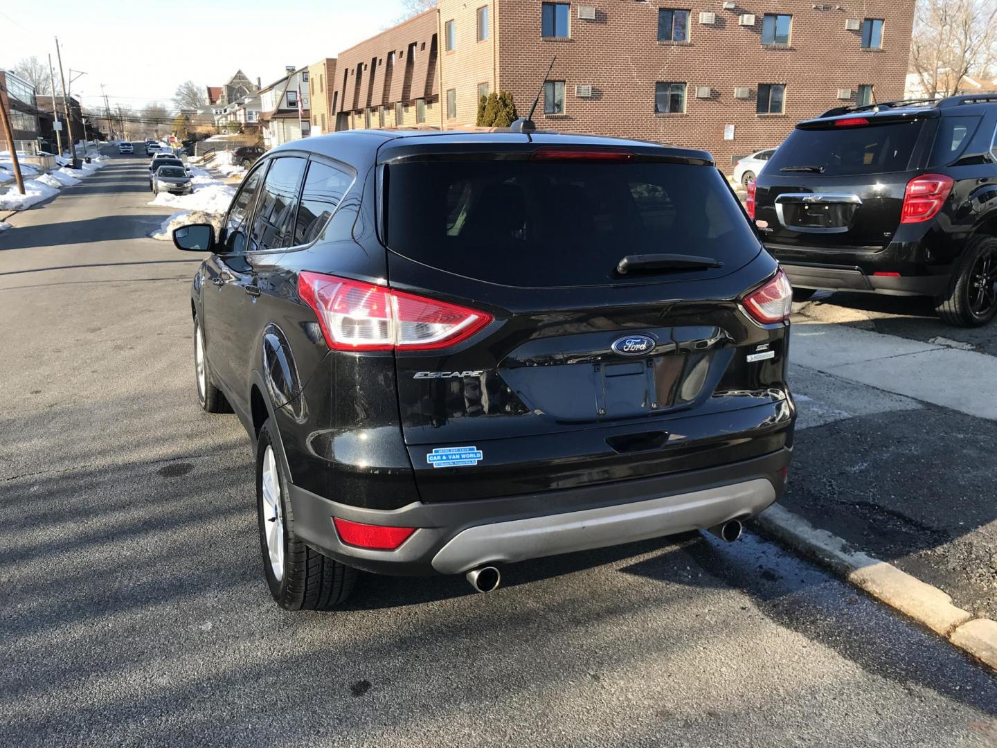 2013 Black /Gray Ford Escape SE (1FMCU0G99DU) with an 2.0L L4 DOHC 16V engine, 6-Speed Automatic transmission, located at 577 Chester Pike, Prospect Park, PA, 19076, (610) 237-1015, 39.886154, -75.302338 - 2013 Ford Escape SE: Only 98k miles, sunroof, great on gas, new PA inspection, runs excellent, SUPER CLEAN! This vehicle comes inspected and has been given a bumper to bumper safety check. It is very clean, reliable, and well maintained. We offer a unique pay plan that is known for being the easi - Photo#5