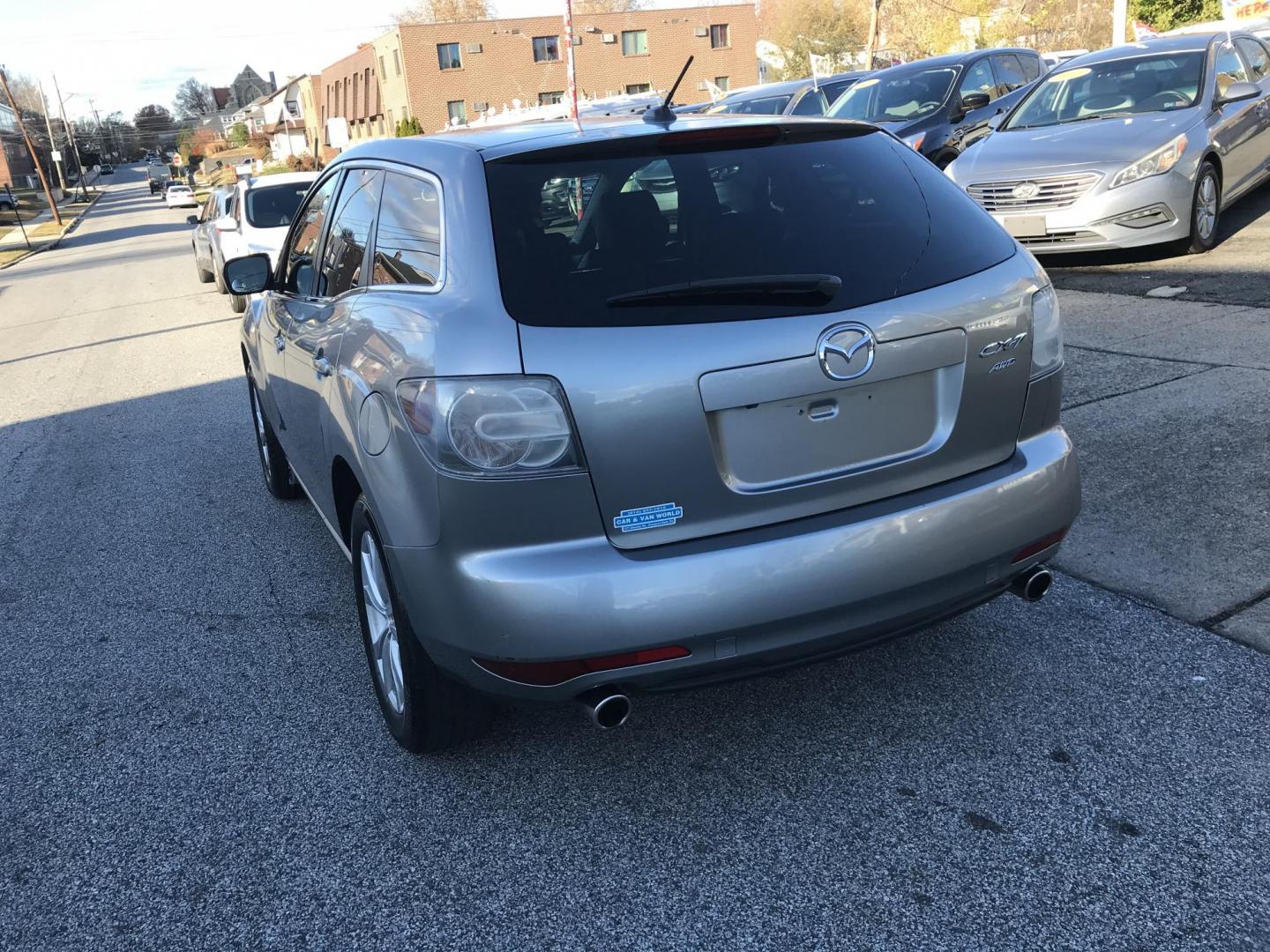 2011 Gray /Gray Mazda CX-7 s Touring AWD (JM3ER4CL3B0) with an 2.3L L4 DOHC 16V TURBO engine, 6-Speed Automatic transmission, located at 577 Chester Pike, Prospect Park, PA, 19076, (610) 237-1015, 39.886154, -75.302338 - 2011 Mazda CX-7 Touring: Only 88k miles, sunroof, backup camera, black leather interior, runs EXCELLENT! This vehicle comes inspected and has been given a bumper to bumper safety check. It is very clean, reliable, and well maintained. We offer a unique pay plan that is known for being the easiest - Photo#5