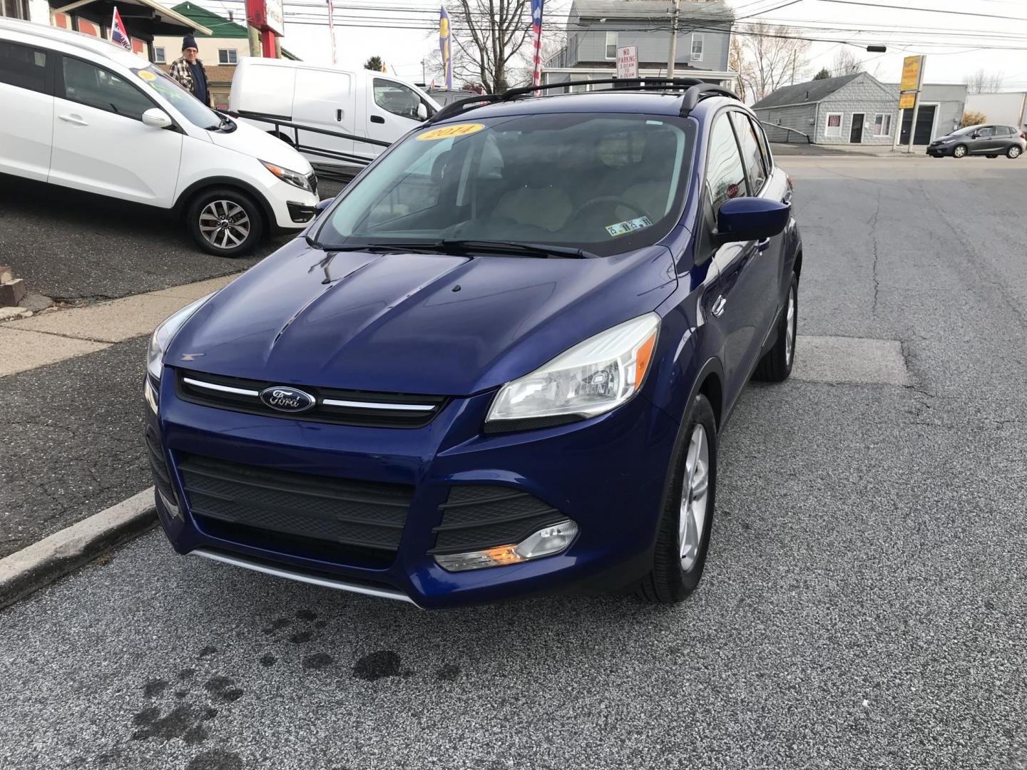2014 Blue /Gray Ford Escape SE (1FMCU0GX7EU) with an 1.6L L4 DOHC 16V engine, 6-Speed Automatic transmission, located at 577 Chester Pike, Prospect Park, PA, 19076, (610) 237-1015, 39.886154, -75.302338 - Photo#2