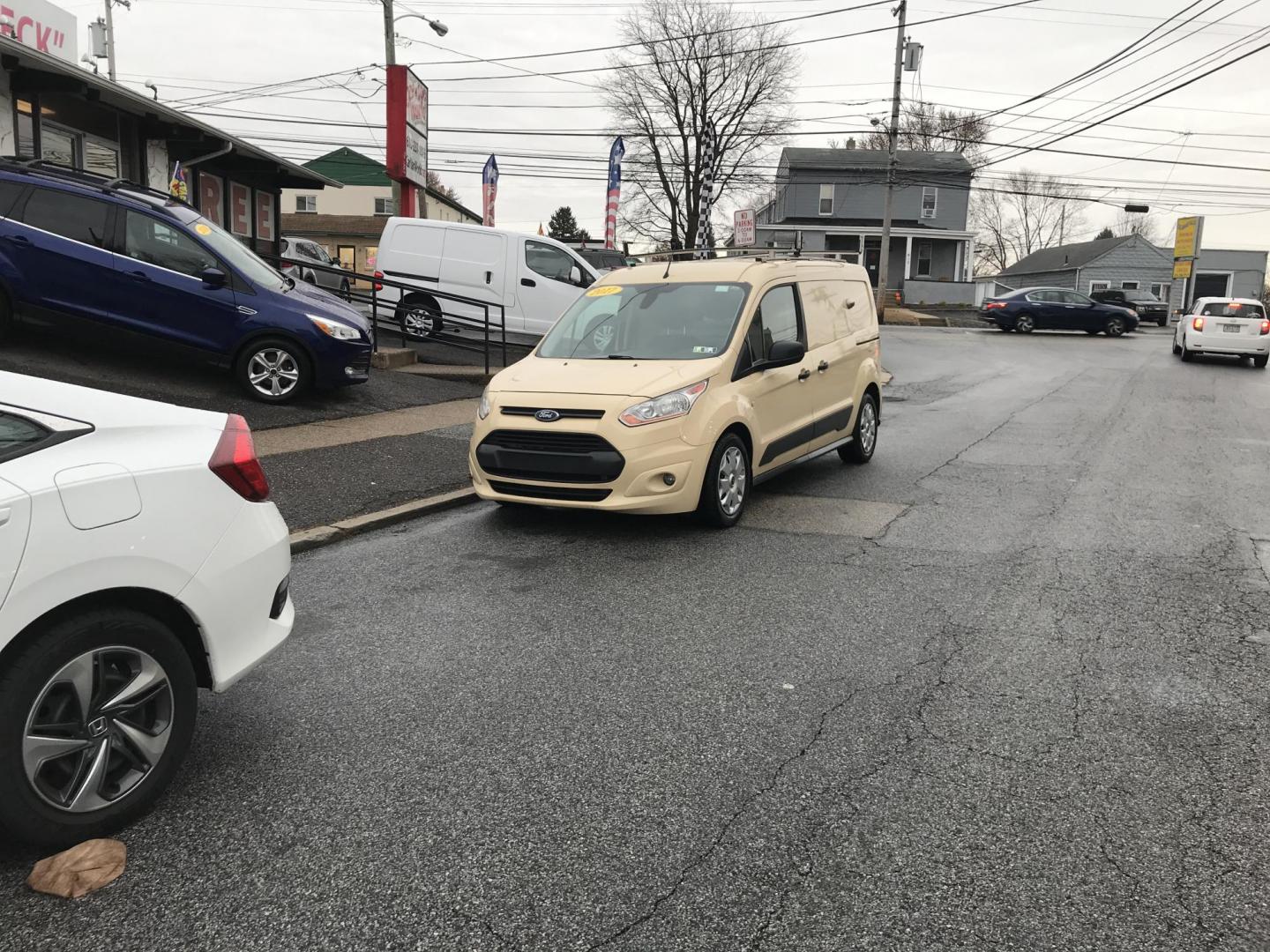 2017 Tan /Gray Ford Transit Connect Cargo Van XLT (NM0LS7F74H1) with an 2.5L L4 DOHC 16V engine, 6A transmission, located at 577 Chester Pike, Prospect Park, PA, 19076, (610) 237-1015, 39.886154, -75.302338 - 2017 Ford Transit Connect: Fleet maintained, backup camera, ladder racks, shelving (can be removed), no rear or side windows, has lock on rear and side doors, runs LIKE NEW! This vehicle comes inspected and has been given a bumper to bumper safety check. It is very clean, reliable, and well maint - Photo#1