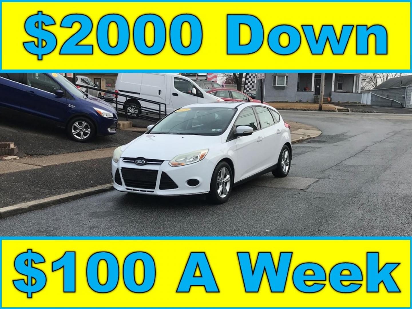 2013 White /Tan Ford Focus SE Hatch (1FADP3K25DL) with an 2.0L L4 DOHC 16V engine, located at 577 Chester Pike, Prospect Park, PA, 19076, (610) 237-1015, 39.886154, -75.302338 - Photo#0