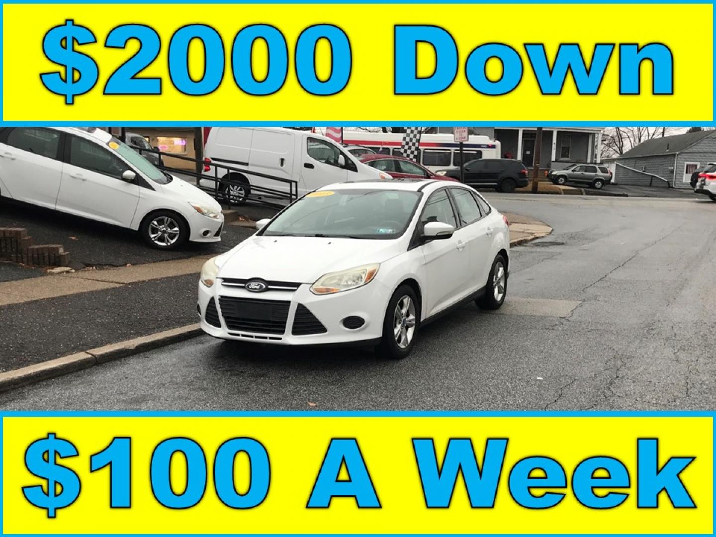 2013 White /Black Ford Focus SE Sedan (1FADP3F20DL) with an 2.0L L4 DOHC 16V engine, Automatic transmission, located at 577 Chester Pike, Prospect Park, PA, 19076, (610) 237-1015, 39.886154, -75.302338 - Photo#0