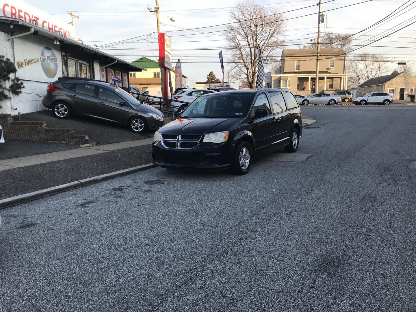 2011 Black /Black Dodge Grand Caravan Mainstreet (2D4RN3DG6BR) with an 3.6L V6 DOHC 24V engine, 6-Speed Automatic transmission, located at 577 Chester Pike, Prospect Park, PA, 19076, (610) 237-1015, 39.886154, -75.302338 - Photo#1