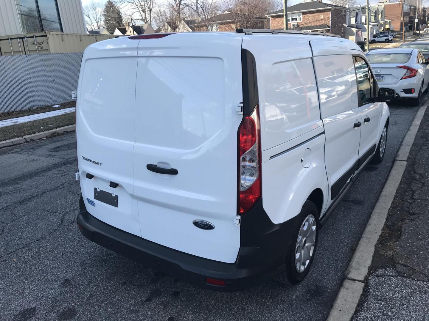 2017 White /Gray Ford Transit Connect Cargo Van XL LWB w/Rear 180 Degree Door (NM0LS7E74H1) with an 2.5L L4 DOHC 16V engine, 6A transmission, located at 577 Chester Pike, Prospect Park, PA, 19076, (610) 237-1015, 39.886154, -75.302338 - 2017 Ford Transit Connect: No side or rear windows, shelving, partition, new PA inspection, FLEET MAINTAINED, runs LIKE NEW! This vehicle comes inspected and has been given a bumper to bumper safety check. It is very clean, reliable, and well maintained. We offer a unique pay plan that is known f - Photo#5
