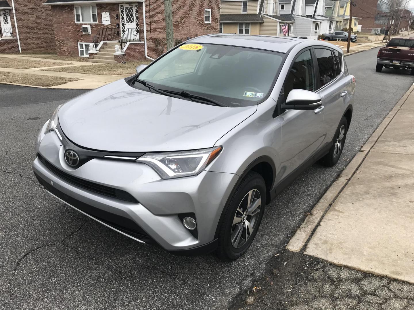 2018 Silver /Black Toyota RAV4 XLE (2T3WFREV1JW) with an 2.5L L4 DOHC 16V engine, 6A transmission, located at 577 Chester Pike, Prospect Park, PA, 19076, (610) 237-1015, 39.886154, -75.302338 - Photo#1