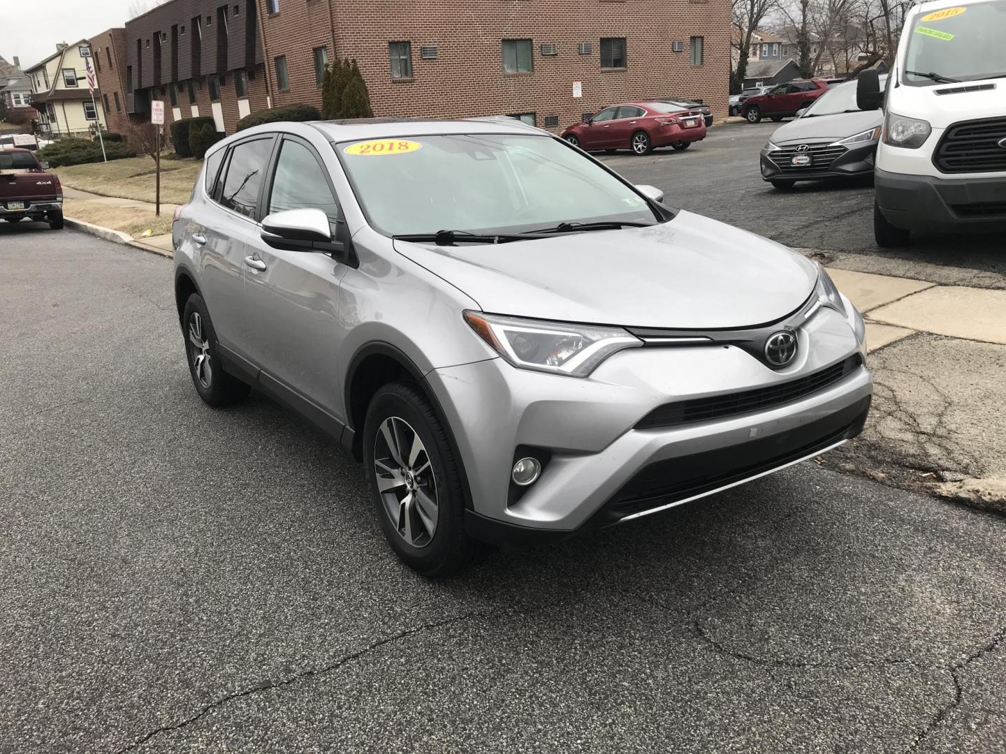2018 Silver /Black Toyota RAV4 XLE (2T3WFREV1JW) with an 2.5L L4 DOHC 16V engine, 6A transmission, located at 577 Chester Pike, Prospect Park, PA, 19076, (610) 237-1015, 39.886154, -75.302338 - Photo#2