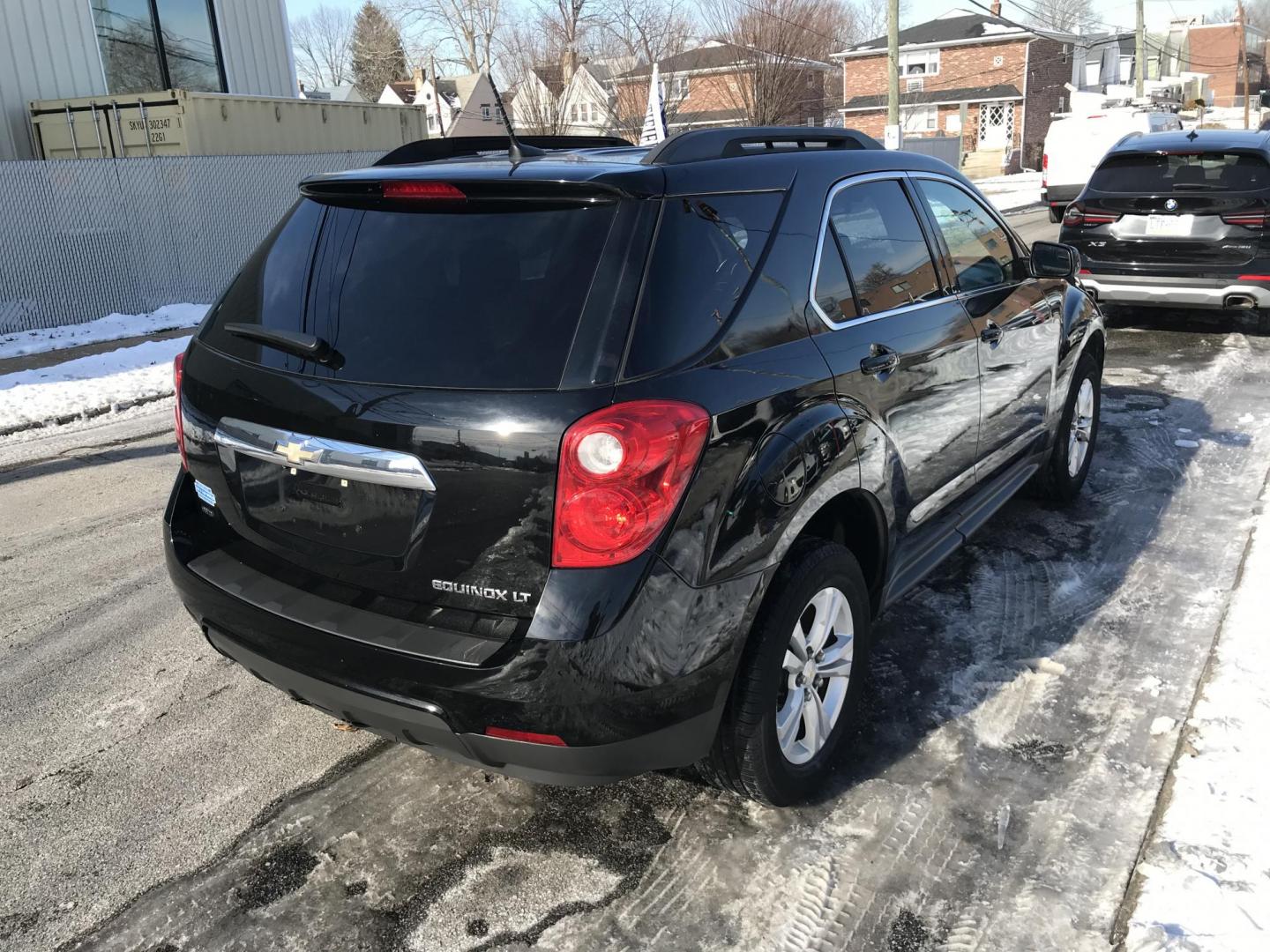 2013 Black /Black Chevrolet Equinox 1LT AWD (2GNFLEEKXD6) with an 2.4L L4 DOHC 16V engine, 6-Speed Automatic transmission, located at 577 Chester Pike, Prospect Park, PA, 19076, (610) 237-1015, 39.886154, -75.302338 - Photo#5