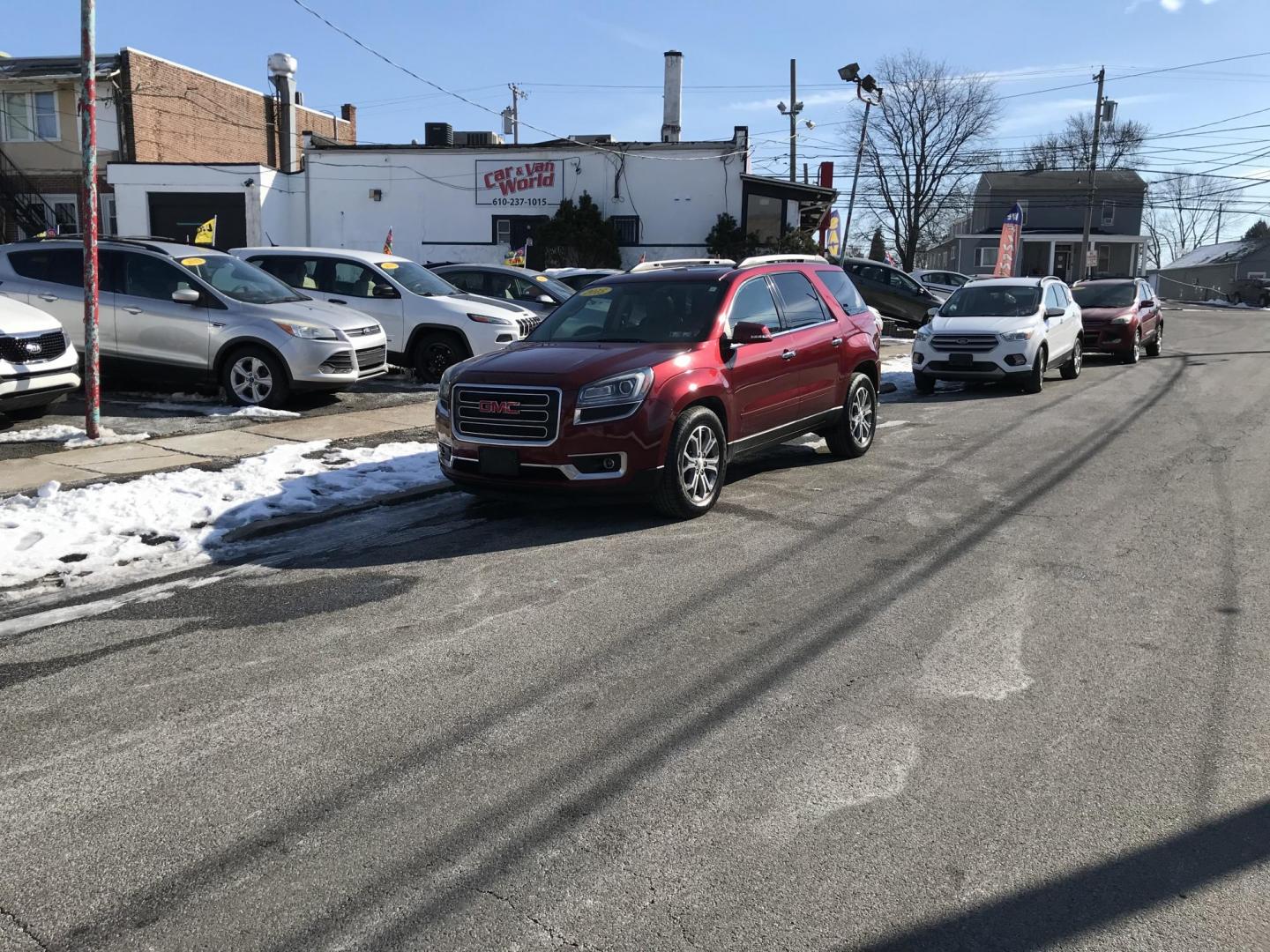 2015 Red /Gray GMC Acadia SLT-1 AWD (1GKKVRKD6FJ) with an 3.6L V6 DOHC 24V engine, 6-Speed Automatic transmission, located at 577 Chester Pike, Prospect Park, PA, 19076, (610) 237-1015, 39.886154, -75.302338 - Photo#1