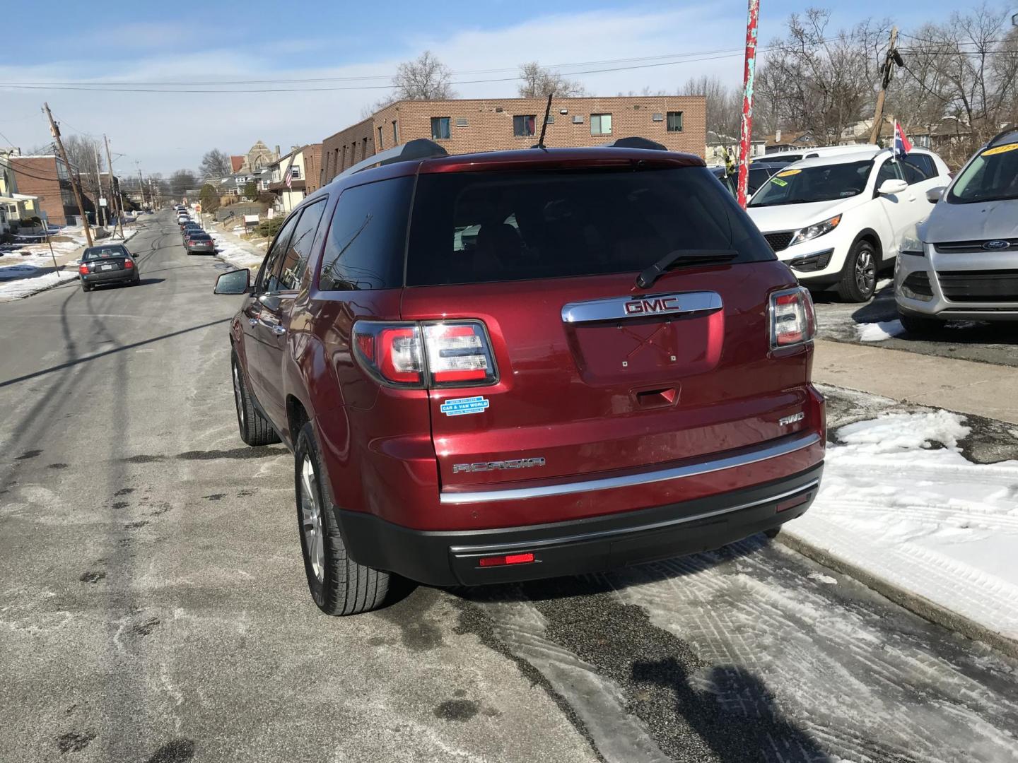 2015 Red /Gray GMC Acadia SLT-1 AWD (1GKKVRKD6FJ) with an 3.6L V6 DOHC 24V engine, 6-Speed Automatic transmission, located at 577 Chester Pike, Prospect Park, PA, 19076, (610) 237-1015, 39.886154, -75.302338 - Photo#4