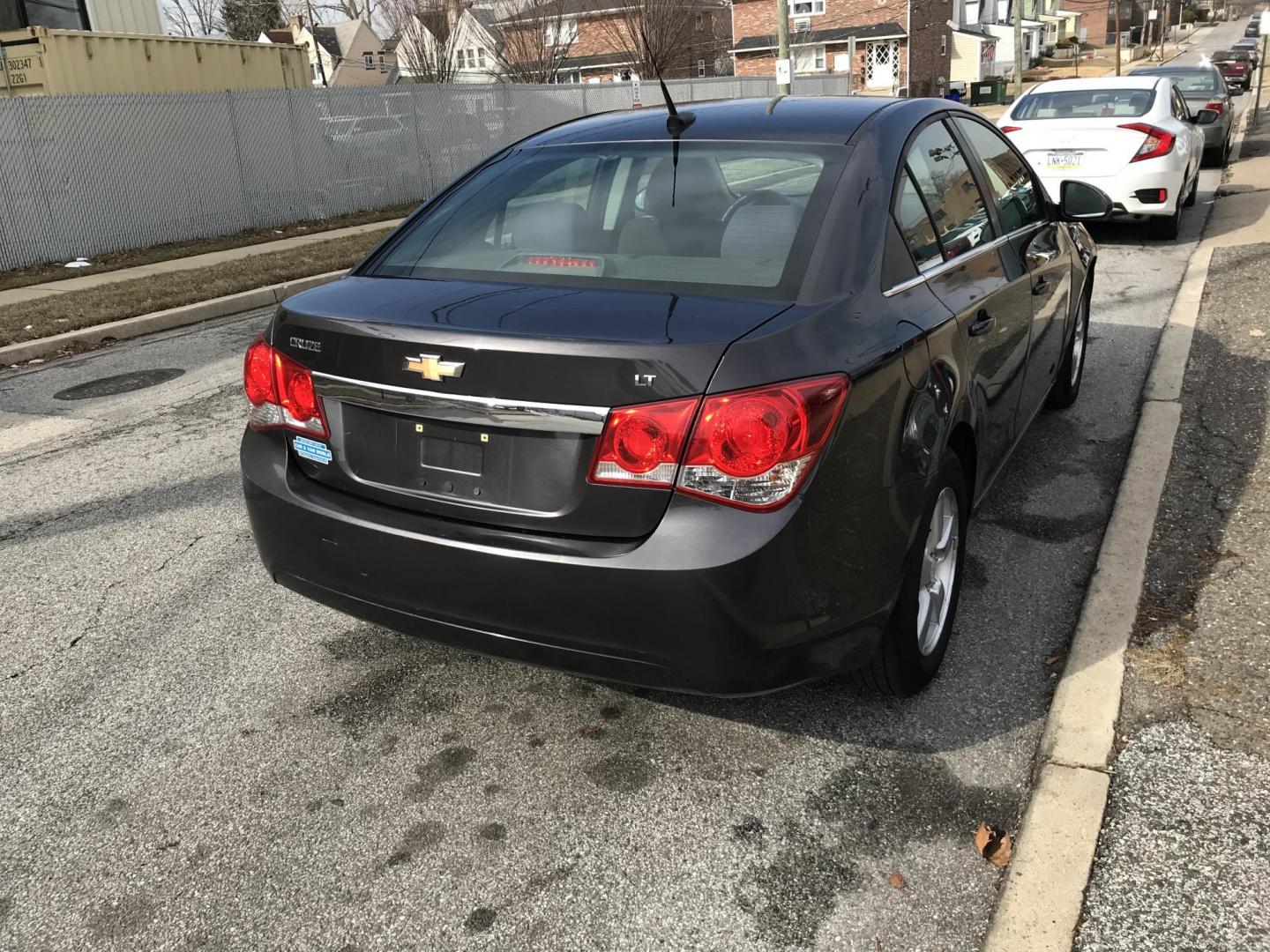 2014 Gray /Black Chevrolet Cruze 1LT Auto (1G1PC5SB7E7) with an 1.4L L4 DOHC 16V TURBO engine, 6-Speed Automatic transmission, located at 577 Chester Pike, Prospect Park, PA, 19076, (610) 237-1015, 39.886154, -75.302338 - Photo#3