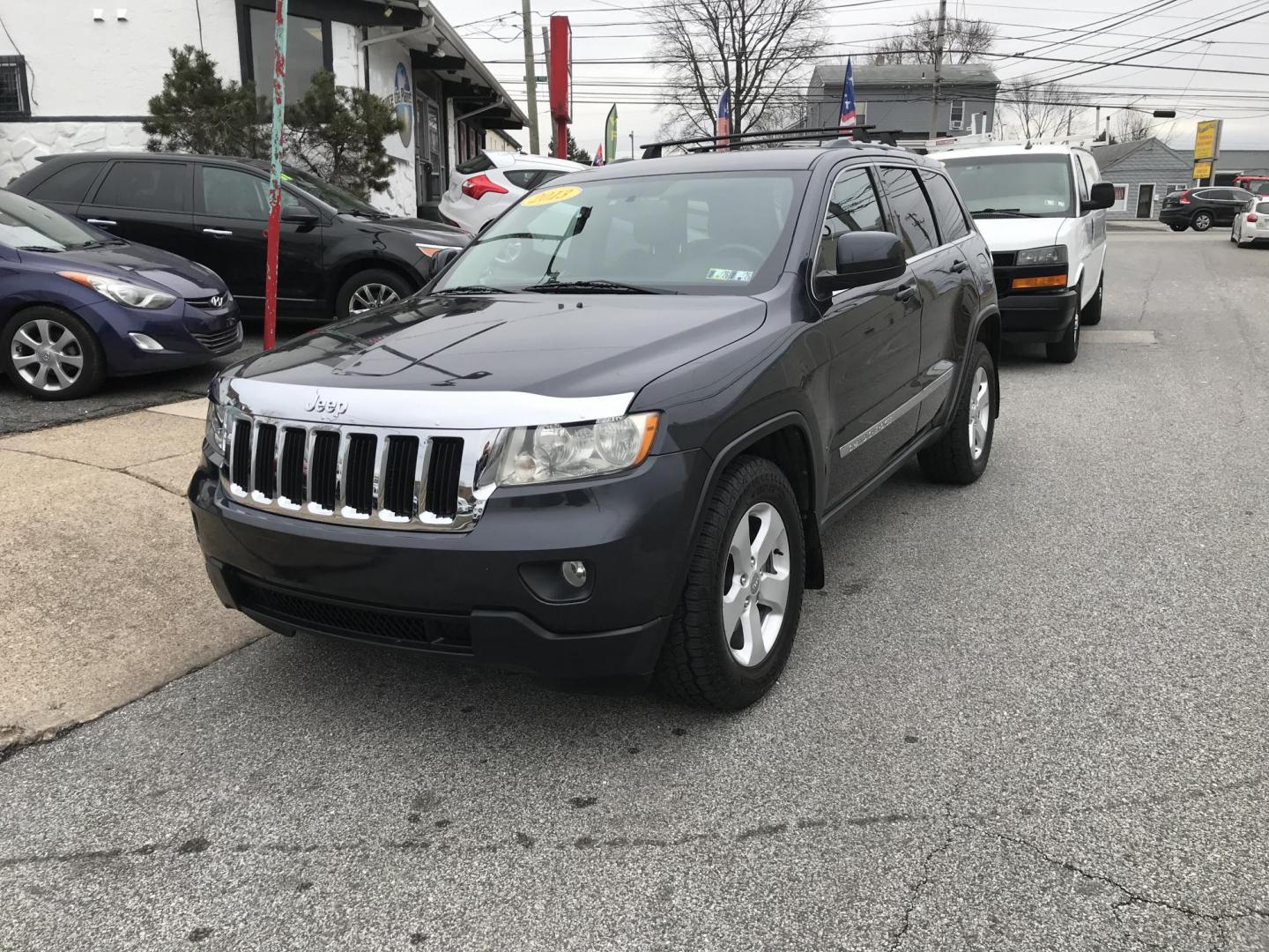 2013 Black /Black Jeep Grand Cherokee Laredo 4WD (1C4RJFAT5DC) with an 5.7L V8 OHV 16V engine, 5-Speed Automatic transmission, located at 577 Chester Pike, Prospect Park, PA, 19076, (610) 237-1015, 39.886154, -75.302338 - 2013 Jeep Grand Cherokee Laredo: Backup camera, 5.7 HEMI engine, 4x4, trailer hitch, leather seats, new PA inspection, runs LIKE NEW! This vehicle comes inspected and has been given a bumper to bumper safety check. It is very clean, reliable, and well maintained. We offer a unique pay plan that i - Photo#1