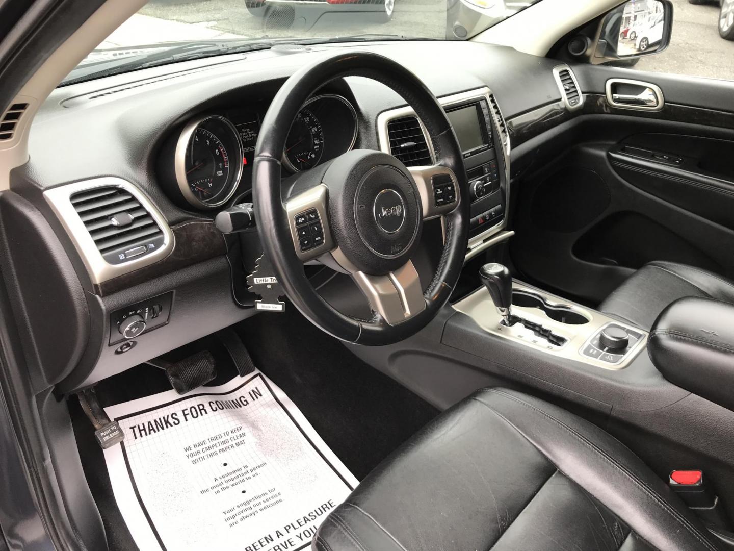 2013 Black /Black Jeep Grand Cherokee Laredo 4WD (1C4RJFAT5DC) with an 5.7L V8 OHV 16V engine, 5-Speed Automatic transmission, located at 577 Chester Pike, Prospect Park, PA, 19076, (610) 237-1015, 39.886154, -75.302338 - 2013 Jeep Grand Cherokee Laredo: Backup camera, 5.7 HEMI engine, 4x4, trailer hitch, leather seats, new PA inspection, runs LIKE NEW! This vehicle comes inspected and has been given a bumper to bumper safety check. It is very clean, reliable, and well maintained. We offer a unique pay plan that i - Photo#12