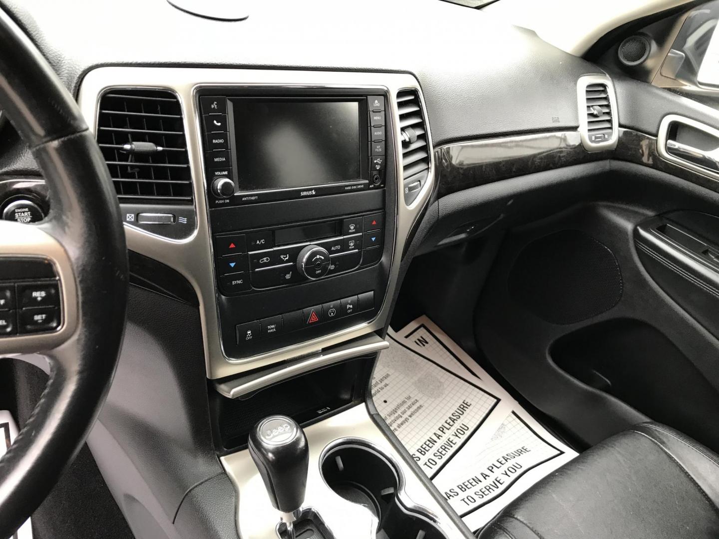 2013 Black /Black Jeep Grand Cherokee Laredo 4WD (1C4RJFAT5DC) with an 5.7L V8 OHV 16V engine, 5-Speed Automatic transmission, located at 577 Chester Pike, Prospect Park, PA, 19076, (610) 237-1015, 39.886154, -75.302338 - 2013 Jeep Grand Cherokee Laredo: Backup camera, 5.7 HEMI engine, 4x4, trailer hitch, leather seats, new PA inspection, runs LIKE NEW! This vehicle comes inspected and has been given a bumper to bumper safety check. It is very clean, reliable, and well maintained. We offer a unique pay plan that i - Photo#13