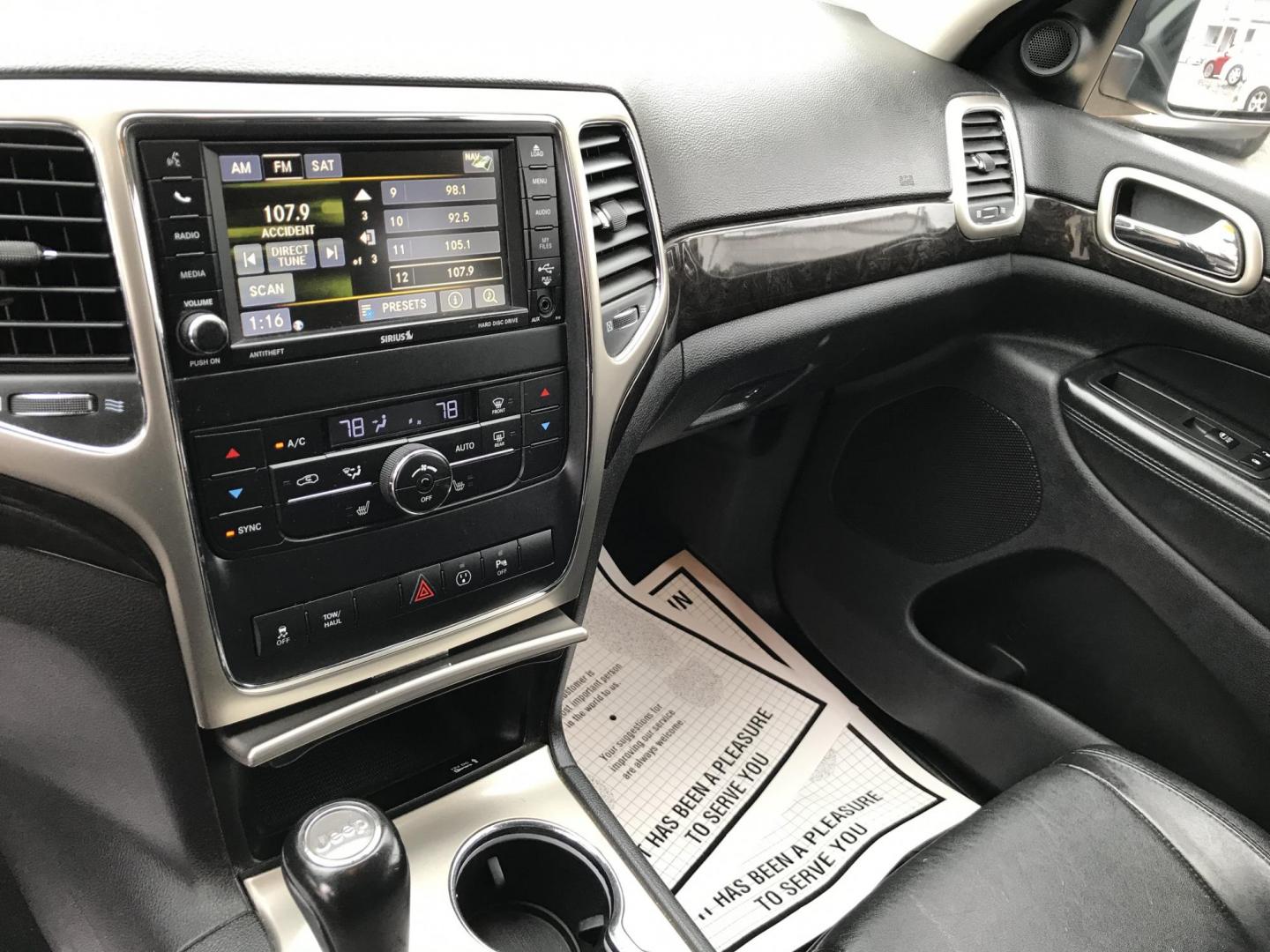 2013 Black /Black Jeep Grand Cherokee Laredo 4WD (1C4RJFAT5DC) with an 5.7L V8 OHV 16V engine, 5-Speed Automatic transmission, located at 577 Chester Pike, Prospect Park, PA, 19076, (610) 237-1015, 39.886154, -75.302338 - 2013 Jeep Grand Cherokee Laredo: Backup camera, 5.7 HEMI engine, 4x4, trailer hitch, leather seats, new PA inspection, runs LIKE NEW! This vehicle comes inspected and has been given a bumper to bumper safety check. It is very clean, reliable, and well maintained. We offer a unique pay plan that i - Photo#14