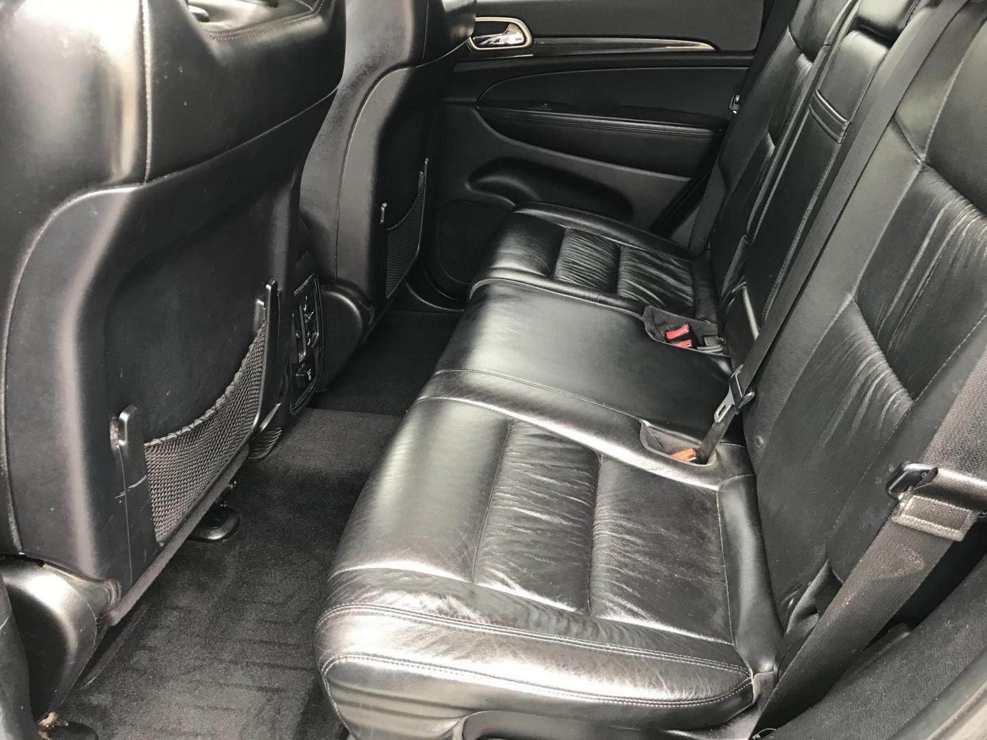 2013 Black /Black Jeep Grand Cherokee Laredo 4WD (1C4RJFAT5DC) with an 5.7L V8 OHV 16V engine, 5-Speed Automatic transmission, located at 577 Chester Pike, Prospect Park, PA, 19076, (610) 237-1015, 39.886154, -75.302338 - 2013 Jeep Grand Cherokee Laredo: Backup camera, 5.7 HEMI engine, 4x4, trailer hitch, leather seats, new PA inspection, runs LIKE NEW! This vehicle comes inspected and has been given a bumper to bumper safety check. It is very clean, reliable, and well maintained. We offer a unique pay plan that i - Photo#19