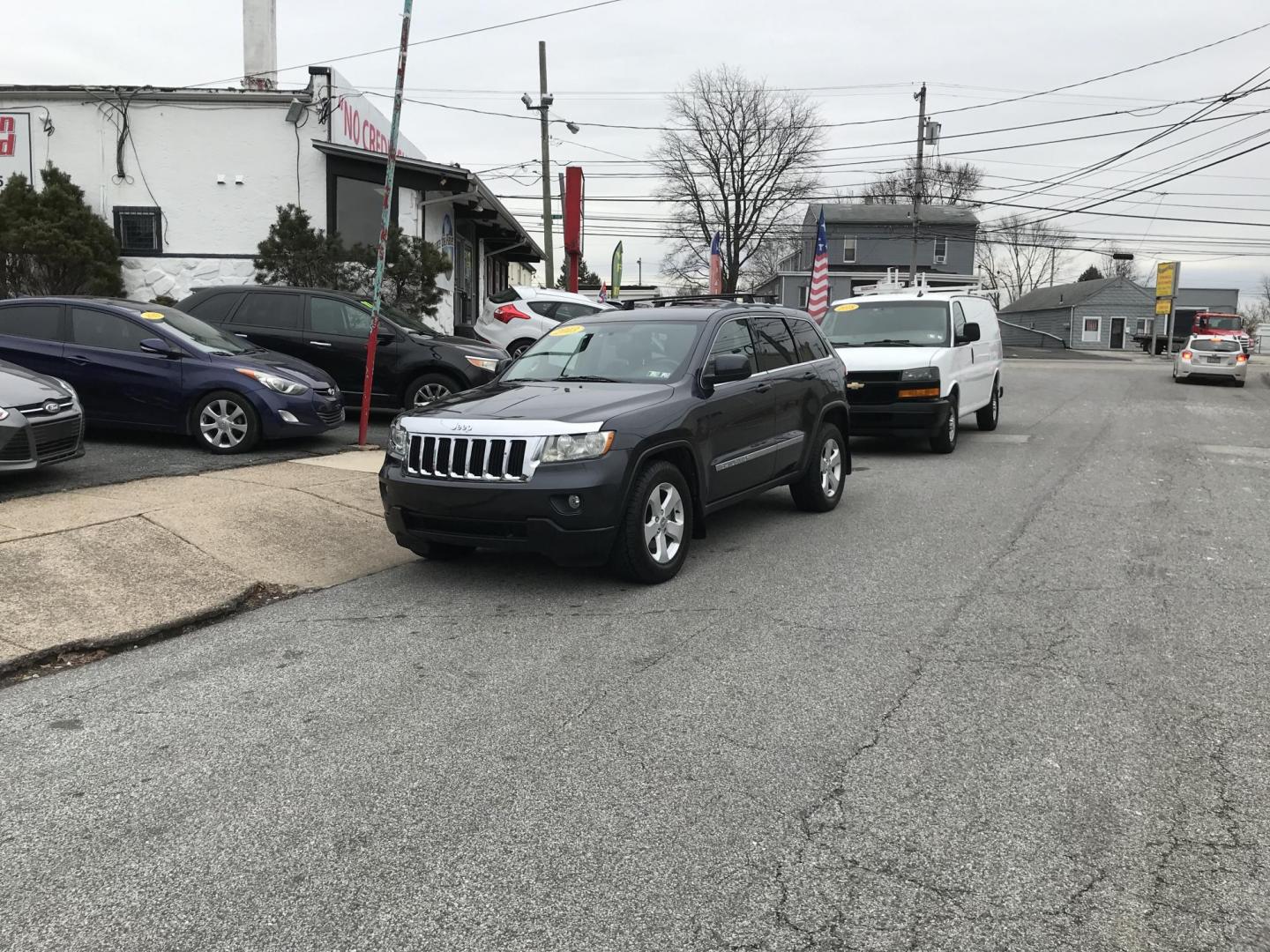 2013 Black /Black Jeep Grand Cherokee Laredo 4WD (1C4RJFAT5DC) with an 5.7L V8 OHV 16V engine, 5-Speed Automatic transmission, located at 577 Chester Pike, Prospect Park, PA, 19076, (610) 237-1015, 39.886154, -75.302338 - 2013 Jeep Grand Cherokee Laredo: Backup camera, 5.7 HEMI engine, 4x4, trailer hitch, leather seats, new PA inspection, runs LIKE NEW! This vehicle comes inspected and has been given a bumper to bumper safety check. It is very clean, reliable, and well maintained. We offer a unique pay plan that i - Photo#2