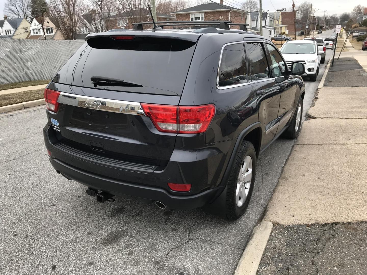 2013 Black /Black Jeep Grand Cherokee Laredo 4WD (1C4RJFAT5DC) with an 5.7L V8 OHV 16V engine, 5-Speed Automatic transmission, located at 577 Chester Pike, Prospect Park, PA, 19076, (610) 237-1015, 39.886154, -75.302338 - 2013 Jeep Grand Cherokee Laredo: Backup camera, 5.7 HEMI engine, 4x4, trailer hitch, leather seats, new PA inspection, runs LIKE NEW! This vehicle comes inspected and has been given a bumper to bumper safety check. It is very clean, reliable, and well maintained. We offer a unique pay plan that i - Photo#3