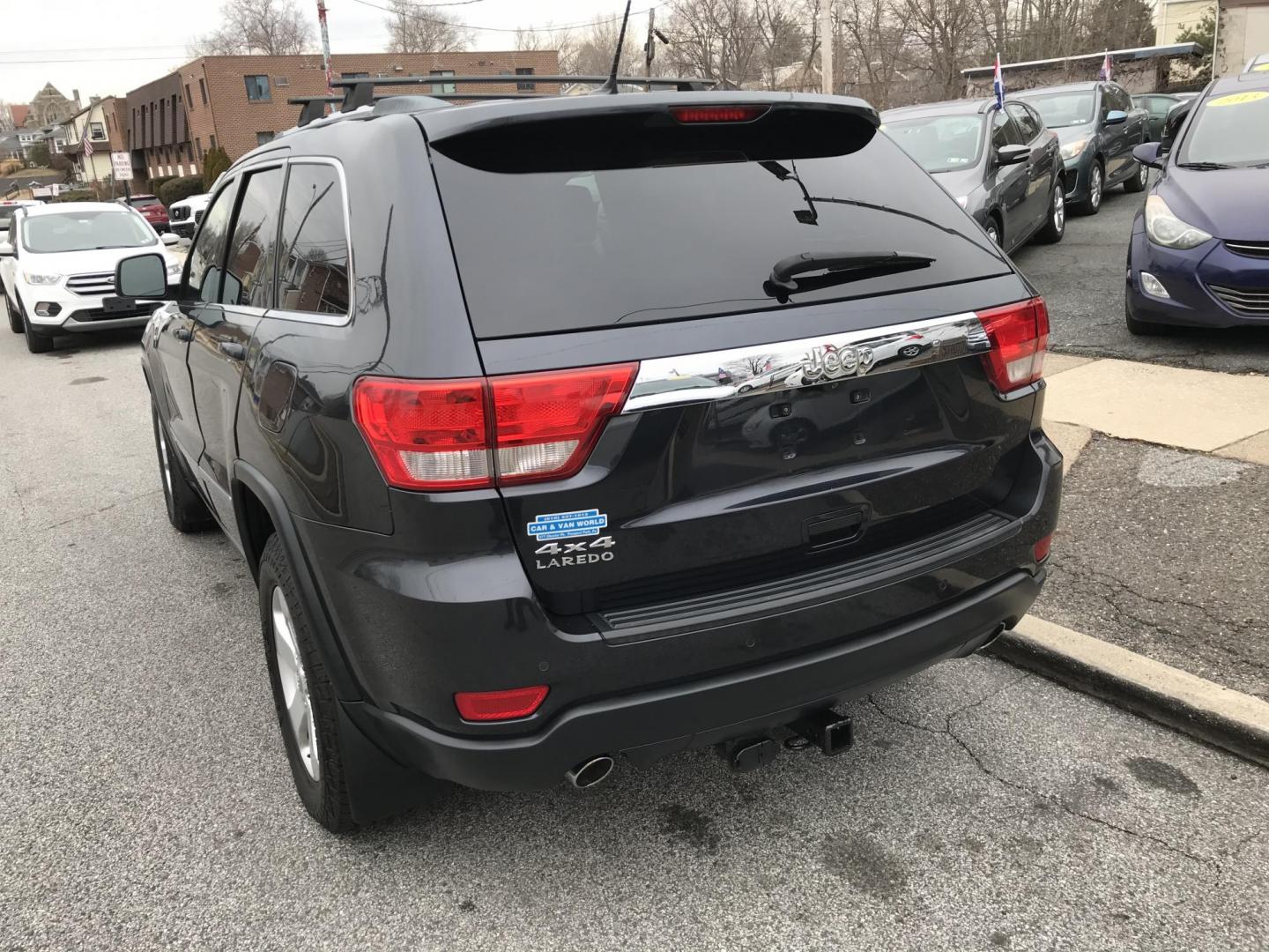 2013 Black /Black Jeep Grand Cherokee Laredo 4WD (1C4RJFAT5DC) with an 5.7L V8 OHV 16V engine, 5-Speed Automatic transmission, located at 577 Chester Pike, Prospect Park, PA, 19076, (610) 237-1015, 39.886154, -75.302338 - 2013 Jeep Grand Cherokee Laredo: Backup camera, 5.7 HEMI engine, 4x4, trailer hitch, leather seats, new PA inspection, runs LIKE NEW! This vehicle comes inspected and has been given a bumper to bumper safety check. It is very clean, reliable, and well maintained. We offer a unique pay plan that i - Photo#7