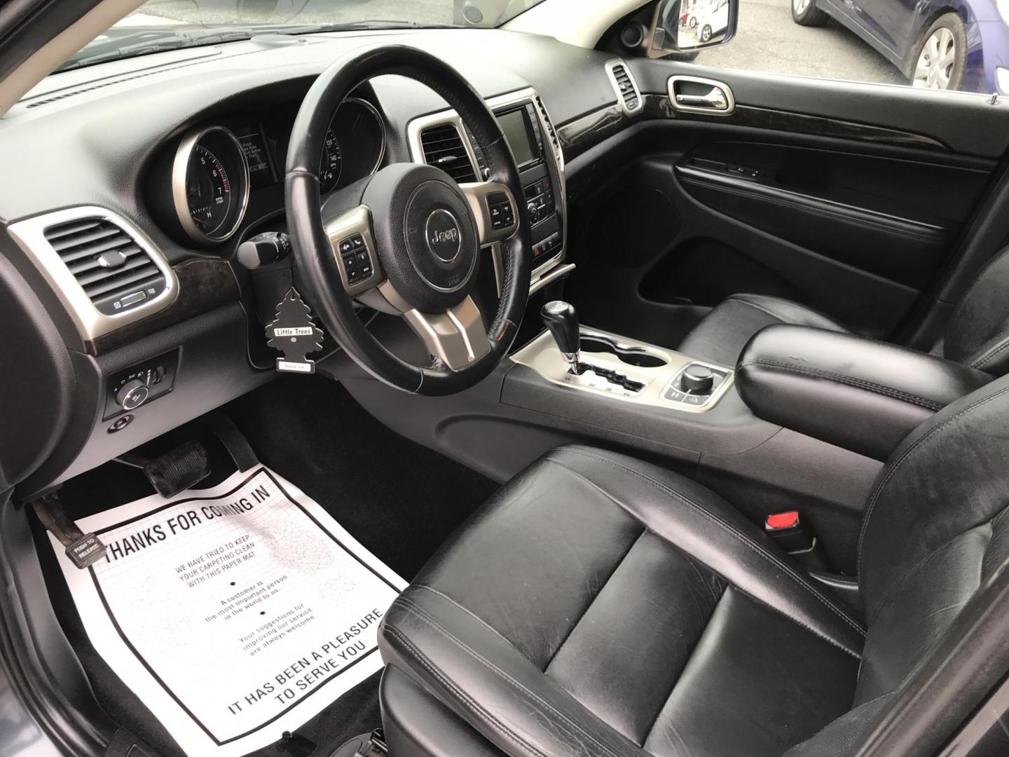 2013 Black /Black Jeep Grand Cherokee Laredo 4WD (1C4RJFAT5DC) with an 5.7L V8 OHV 16V engine, 5-Speed Automatic transmission, located at 577 Chester Pike, Prospect Park, PA, 19076, (610) 237-1015, 39.886154, -75.302338 - 2013 Jeep Grand Cherokee Laredo: Backup camera, 5.7 HEMI engine, 4x4, trailer hitch, leather seats, new PA inspection, runs LIKE NEW! This vehicle comes inspected and has been given a bumper to bumper safety check. It is very clean, reliable, and well maintained. We offer a unique pay plan that i - Photo#8