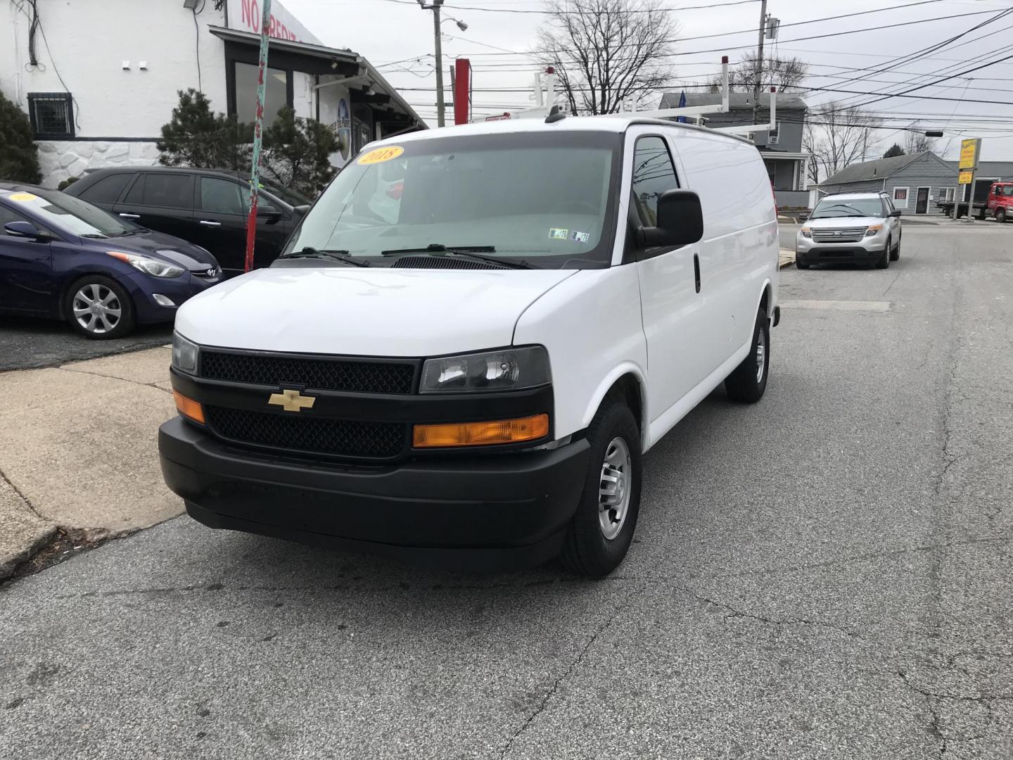 2018 White /Gray Chevrolet Express 2500 Cargo (1GCWGAFG4J1) with an 6.0L V8 OHV 16V FFV engine, 6A transmission, located at 577 Chester Pike, Prospect Park, PA, 19076, (610) 237-1015, 39.886154, -75.302338 - Photo#1
