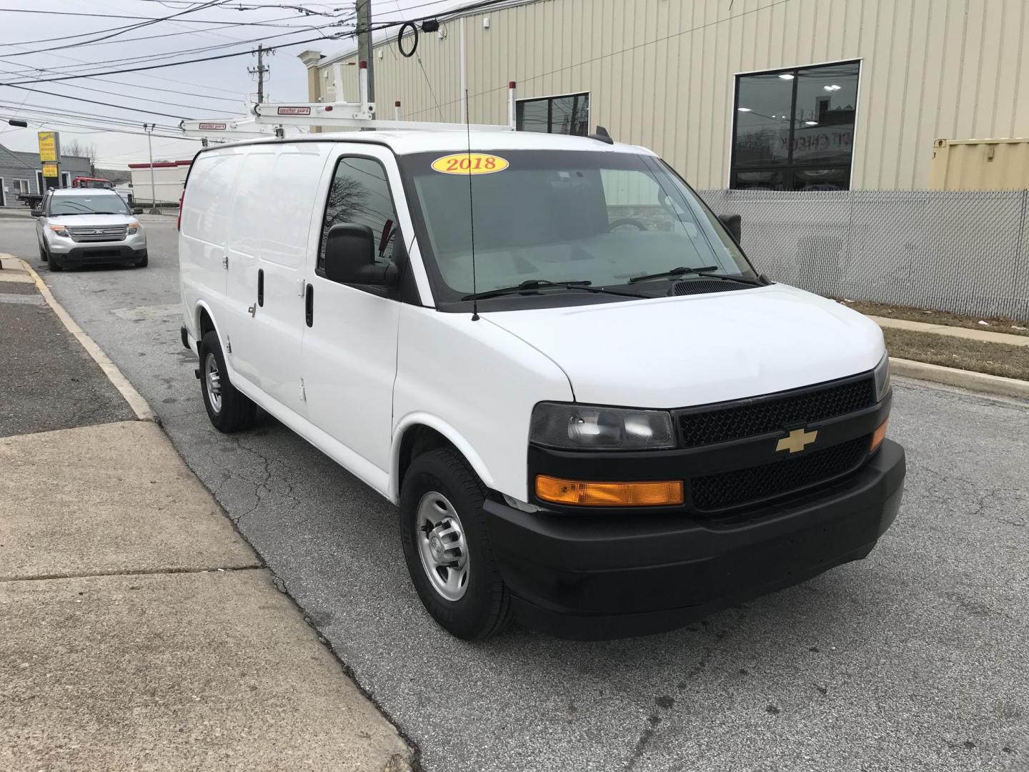 2018 White /Gray Chevrolet Express 2500 Cargo (1GCWGAFG4J1) with an 6.0L V8 OHV 16V FFV engine, 6A transmission, located at 577 Chester Pike, Prospect Park, PA, 19076, (610) 237-1015, 39.886154, -75.302338 - Photo#2