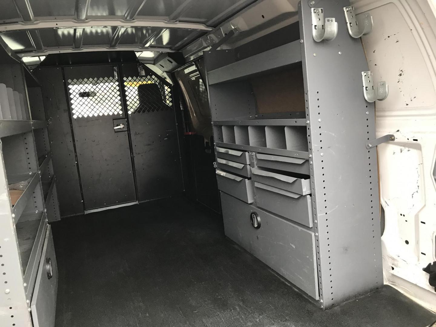 2014 Ford E-Series Van E-250 (1FTNE2EW9ED) with an 4.6L V8 SOHC 16V engine, 4-Speed Automatic transmission, located at 577 Chester Pike, Prospect Park, PA, 19076, (610) 237-1015, 39.886154, -75.302338 - 2014 Ford Econoline E250 Cargo Van: Ladder racks, shelving, no side or rear windows, new PA inspection, FLEET MAINTAINED! This vehicle comes inspected and has been given a bumper to bumper safety check. It is very clean, reliable, and well maintained. We offer a unique pay plan that is known for - Photo#18