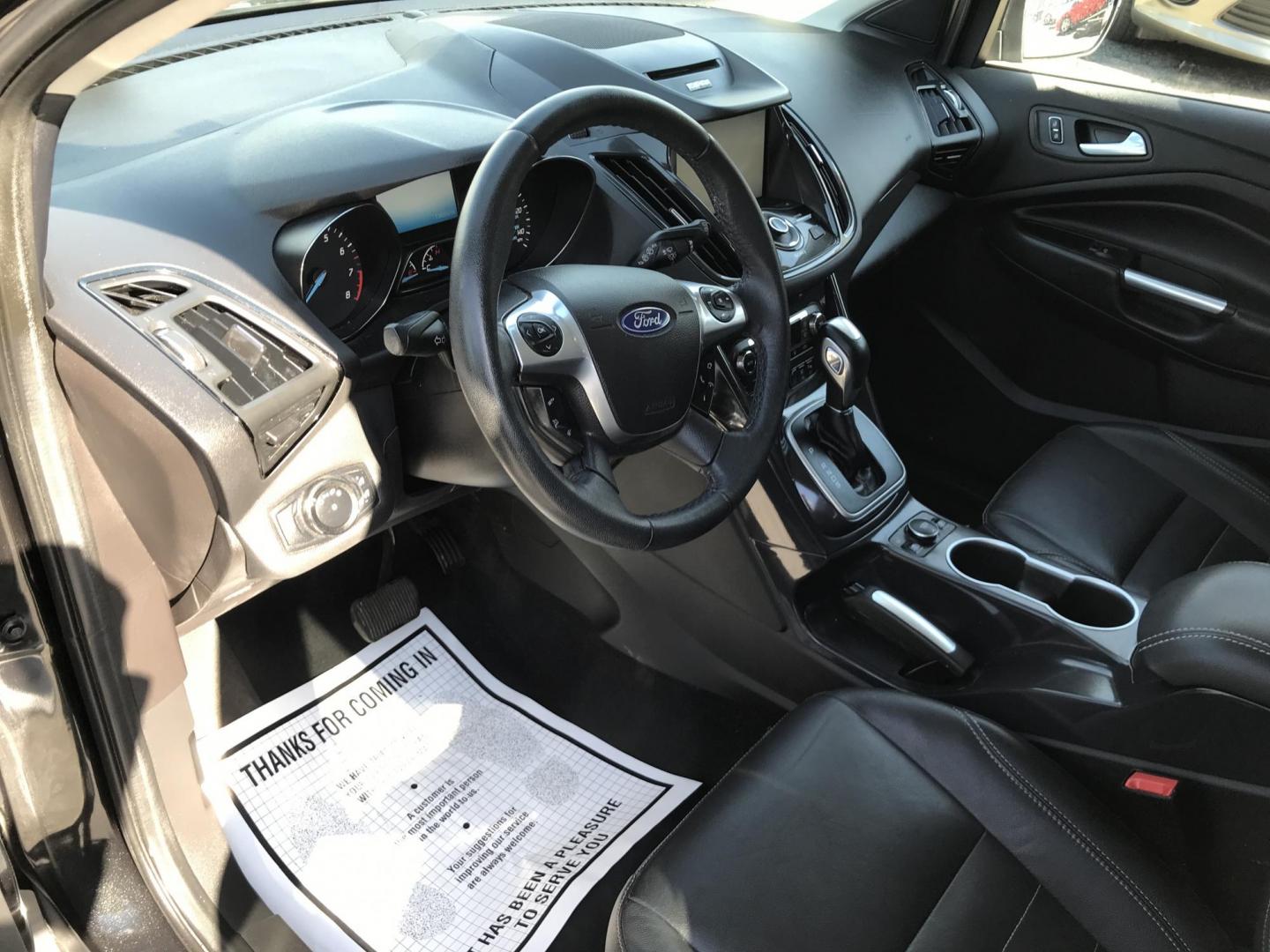 2014 Black /Black Ford Escape Titanium 4WD (1FMCU9J90EU) with an 2.0L L4 DOHC 16V engine, 6-Speed Automatic transmission, located at 577 Chester Pike, Prospect Park, PA, 19076, (610) 237-1015, 39.886154, -75.302338 - 2013 Ford Escape Titanium: Navigation system, backup camera, 4x4, new PA inspection, runs LIKE NEW! This vehicle comes inspected and has been given a bumper to bumper safety check. It is very clean, reliable, and well maintained. We offer a unique pay plan that is known for being the easiest and - Photo#10