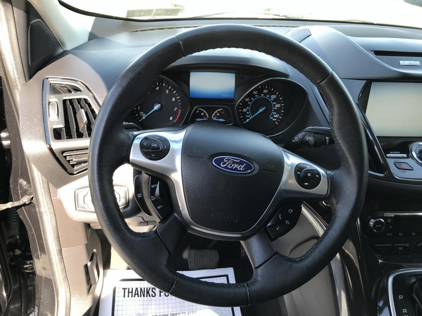 2014 Black /Black Ford Escape Titanium 4WD (1FMCU9J90EU) with an 2.0L L4 DOHC 16V engine, 6-Speed Automatic transmission, located at 577 Chester Pike, Prospect Park, PA, 19076, (610) 237-1015, 39.886154, -75.302338 - 2013 Ford Escape Titanium: Navigation system, backup camera, 4x4, new PA inspection, runs LIKE NEW! This vehicle comes inspected and has been given a bumper to bumper safety check. It is very clean, reliable, and well maintained. We offer a unique pay plan that is known for being the easiest and - Photo#13