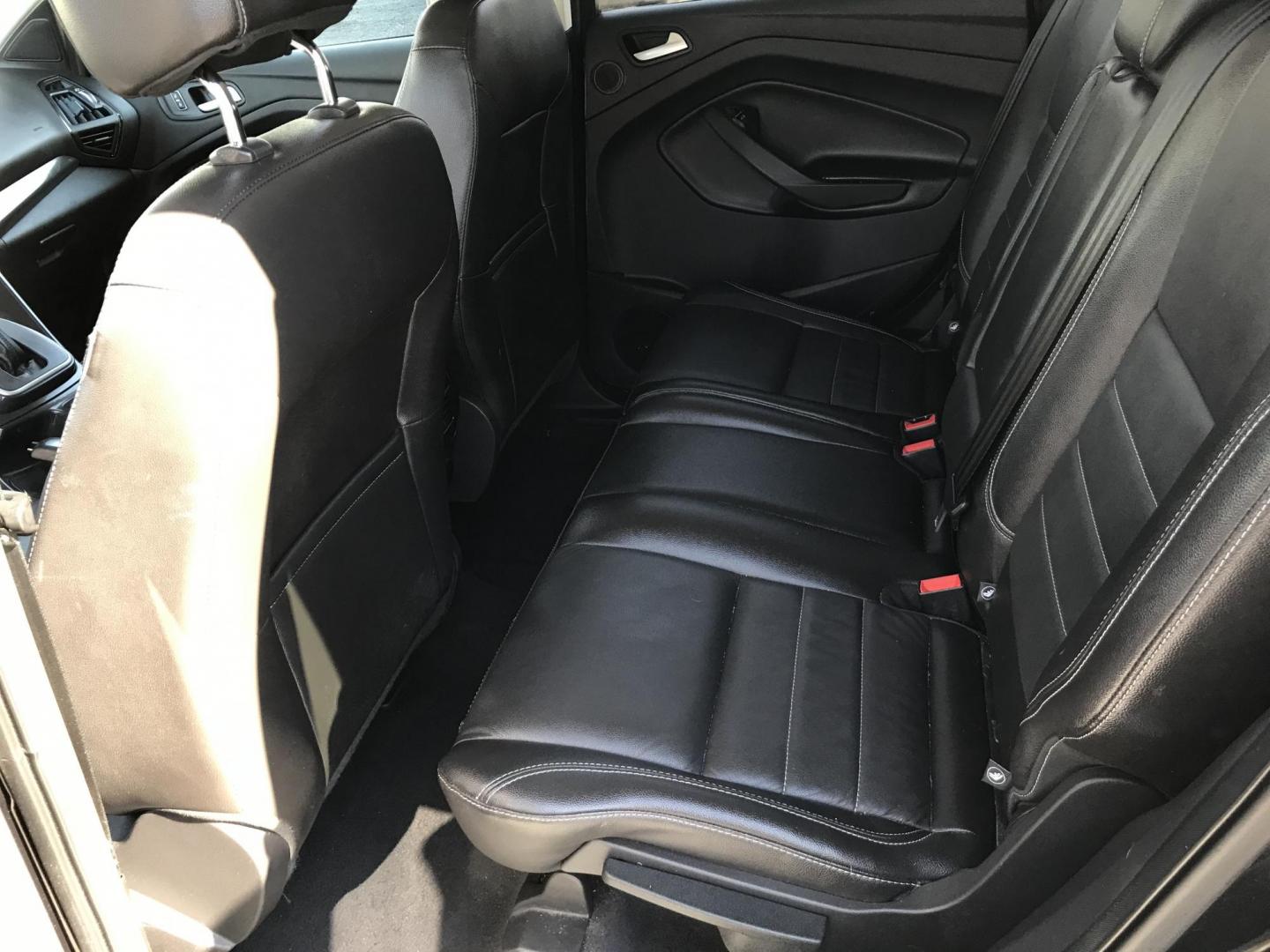 2014 Black /Black Ford Escape Titanium 4WD (1FMCU9J90EU) with an 2.0L L4 DOHC 16V engine, 6-Speed Automatic transmission, located at 577 Chester Pike, Prospect Park, PA, 19076, (610) 237-1015, 39.886154, -75.302338 - 2013 Ford Escape Titanium: Navigation system, backup camera, 4x4, new PA inspection, runs LIKE NEW! This vehicle comes inspected and has been given a bumper to bumper safety check. It is very clean, reliable, and well maintained. We offer a unique pay plan that is known for being the easiest and - Photo#17