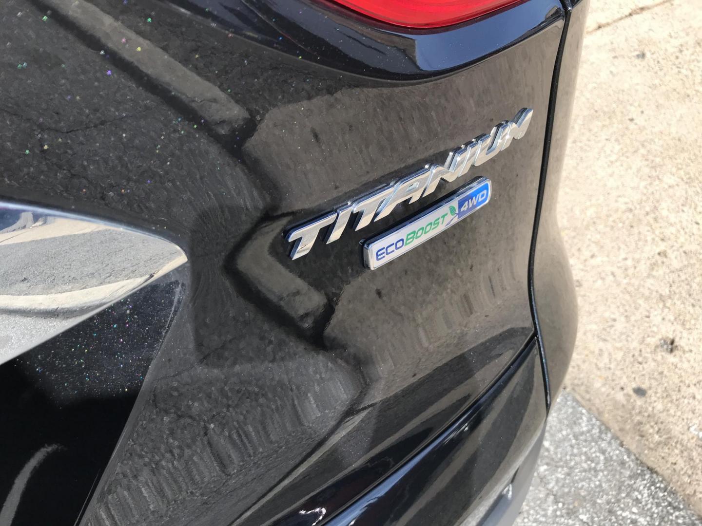 2014 Black /Black Ford Escape Titanium 4WD (1FMCU9J90EU) with an 2.0L L4 DOHC 16V engine, 6-Speed Automatic transmission, located at 577 Chester Pike, Prospect Park, PA, 19076, (610) 237-1015, 39.886154, -75.302338 - 2013 Ford Escape Titanium: Navigation system, backup camera, 4x4, new PA inspection, runs LIKE NEW! This vehicle comes inspected and has been given a bumper to bumper safety check. It is very clean, reliable, and well maintained. We offer a unique pay plan that is known for being the easiest and - Photo#5