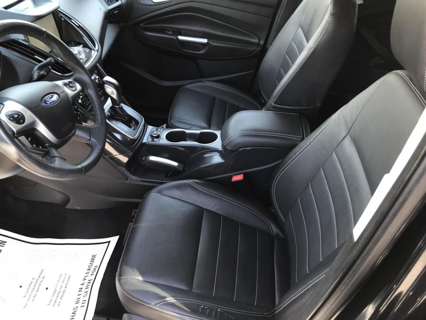 2014 Black /Black Ford Escape Titanium 4WD (1FMCU9J90EU) with an 2.0L L4 DOHC 16V engine, 6-Speed Automatic transmission, located at 577 Chester Pike, Prospect Park, PA, 19076, (610) 237-1015, 39.886154, -75.302338 - 2013 Ford Escape Titanium: Navigation system, backup camera, 4x4, new PA inspection, runs LIKE NEW! This vehicle comes inspected and has been given a bumper to bumper safety check. It is very clean, reliable, and well maintained. We offer a unique pay plan that is known for being the easiest and - Photo#9