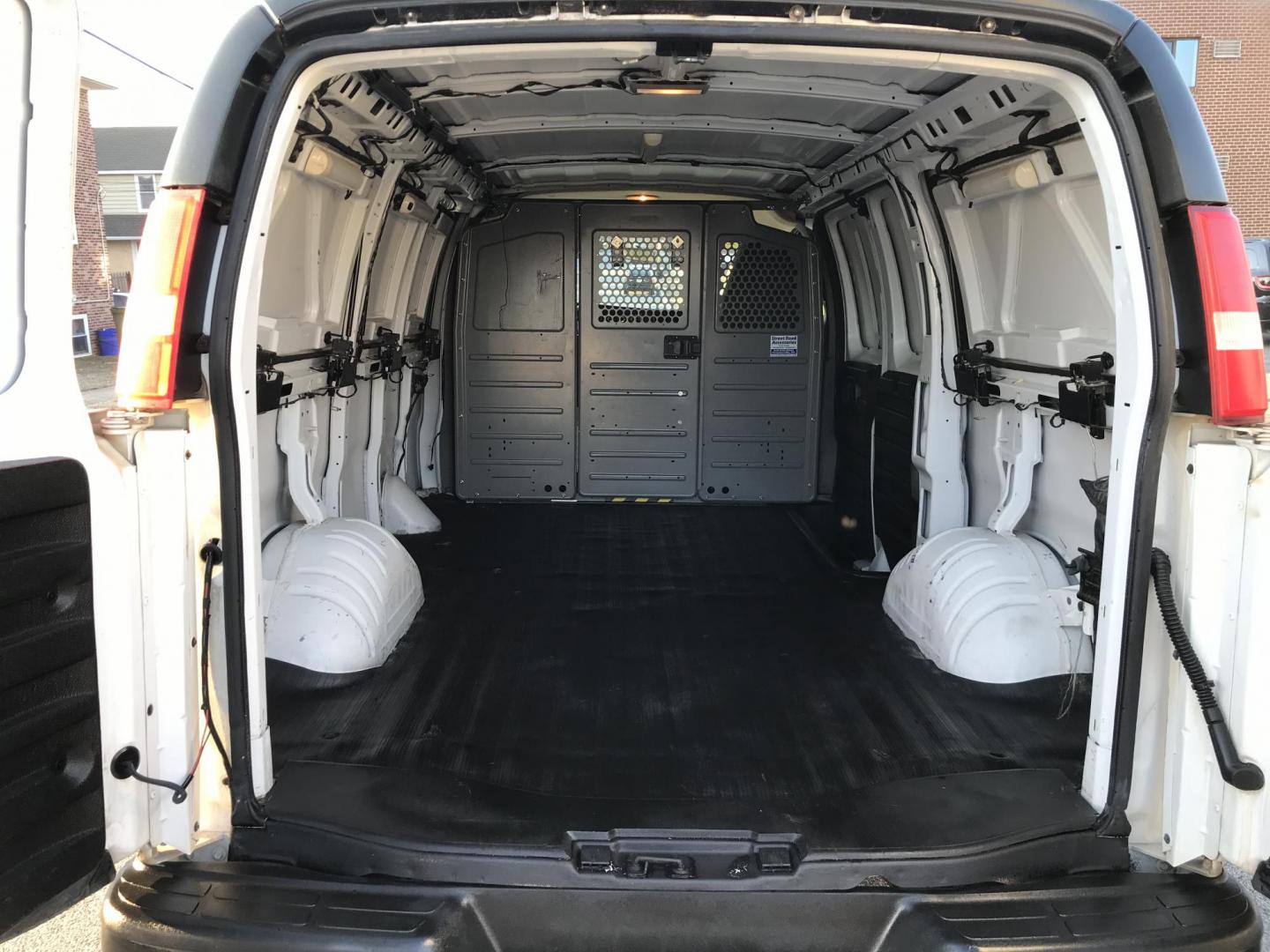 2012 Tan /Gray Chevrolet Express 2500 Cargo (1GCWGFCA4C1) with an 4.8L V8 OHV 16V FFV engine, 6-Speed Automatic transmission, located at 577 Chester Pike, Prospect Park, PA, 19076, (610) 237-1015, 39.886154, -75.302338 - Photo#14