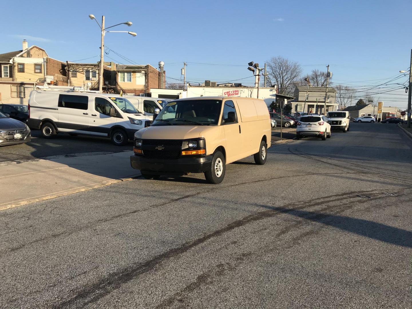 2012 Tan /Gray Chevrolet Express 2500 Cargo (1GCWGFCA4C1) with an 4.8L V8 OHV 16V FFV engine, 6-Speed Automatic transmission, located at 577 Chester Pike, Prospect Park, PA, 19076, (610) 237-1015, 39.886154, -75.302338 - Photo#2
