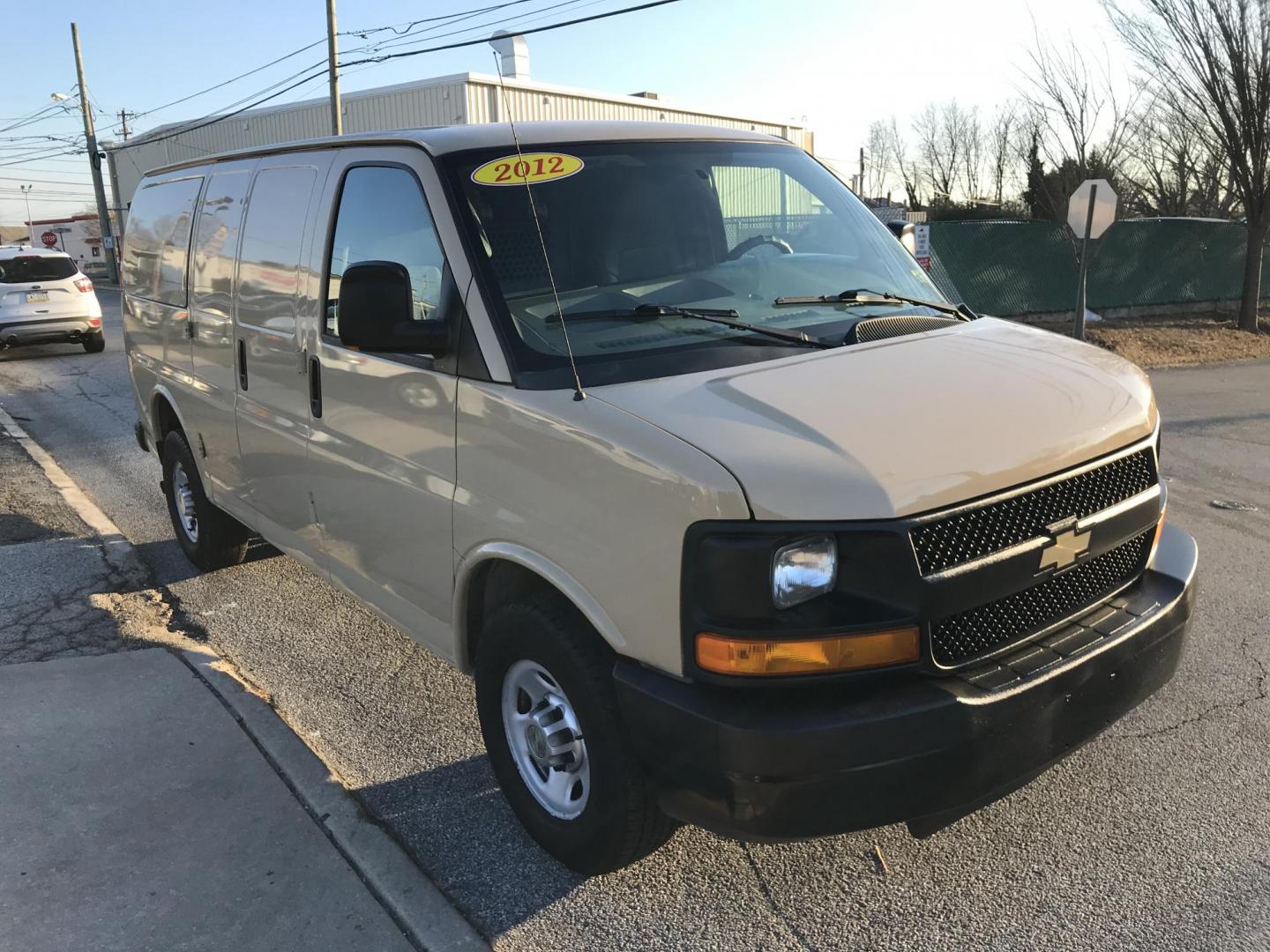 2012 Tan /Gray Chevrolet Express 2500 Cargo (1GCWGFCA4C1) with an 4.8L V8 OHV 16V FFV engine, 6-Speed Automatic transmission, located at 577 Chester Pike, Prospect Park, PA, 19076, (610) 237-1015, 39.886154, -75.302338 - Photo#3