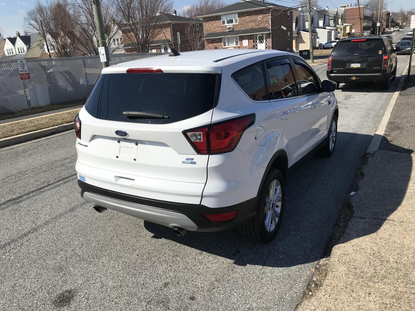 2019 White /Gray Ford Escape SE 4WD (1FMCU9GDXKU) with an 1.5L L4 DOHC 16V engine, 6A transmission, located at 577 Chester Pike, Prospect Park, PA, 19076, (610) 237-1015, 39.886154, -75.302338 - 2019 Ford Escape SE: 4x4, navigation system, backup camera, new PA inspection, SUPER CLEAN, runs LIKE NEW! This vehicle comes inspected and has been given a bumper to bumper safety check. It is very clean, reliable, and well maintained. We offer a unique pay plan that is known for being the easie - Photo#5