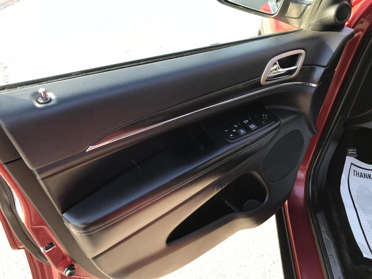 2015 Red /Black Jeep Grand Cherokee Limited 4WD (1C4RJFBGXFC) with an 3.6L V6 DOHC 24V engine, 8-Speed Automatic transmission, located at 577 Chester Pike, Prospect Park, PA, 19076, (610) 237-1015, 39.886154, -75.302338 - Photo#11