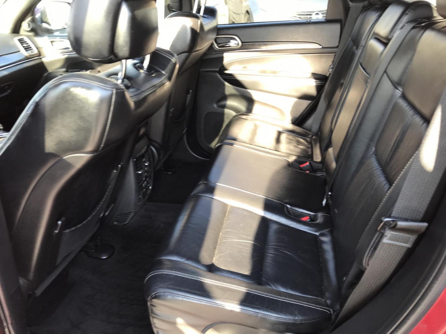 2015 Red /Black Jeep Grand Cherokee Limited 4WD (1C4RJFBGXFC) with an 3.6L V6 DOHC 24V engine, 8-Speed Automatic transmission, located at 577 Chester Pike, Prospect Park, PA, 19076, (610) 237-1015, 39.886154, -75.302338 - Photo#19