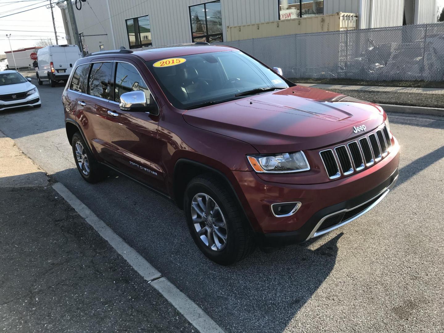 2015 Red /Black Jeep Grand Cherokee Limited 4WD (1C4RJFBGXFC) with an 3.6L V6 DOHC 24V engine, 8-Speed Automatic transmission, located at 577 Chester Pike, Prospect Park, PA, 19076, (610) 237-1015, 39.886154, -75.302338 - Photo#2