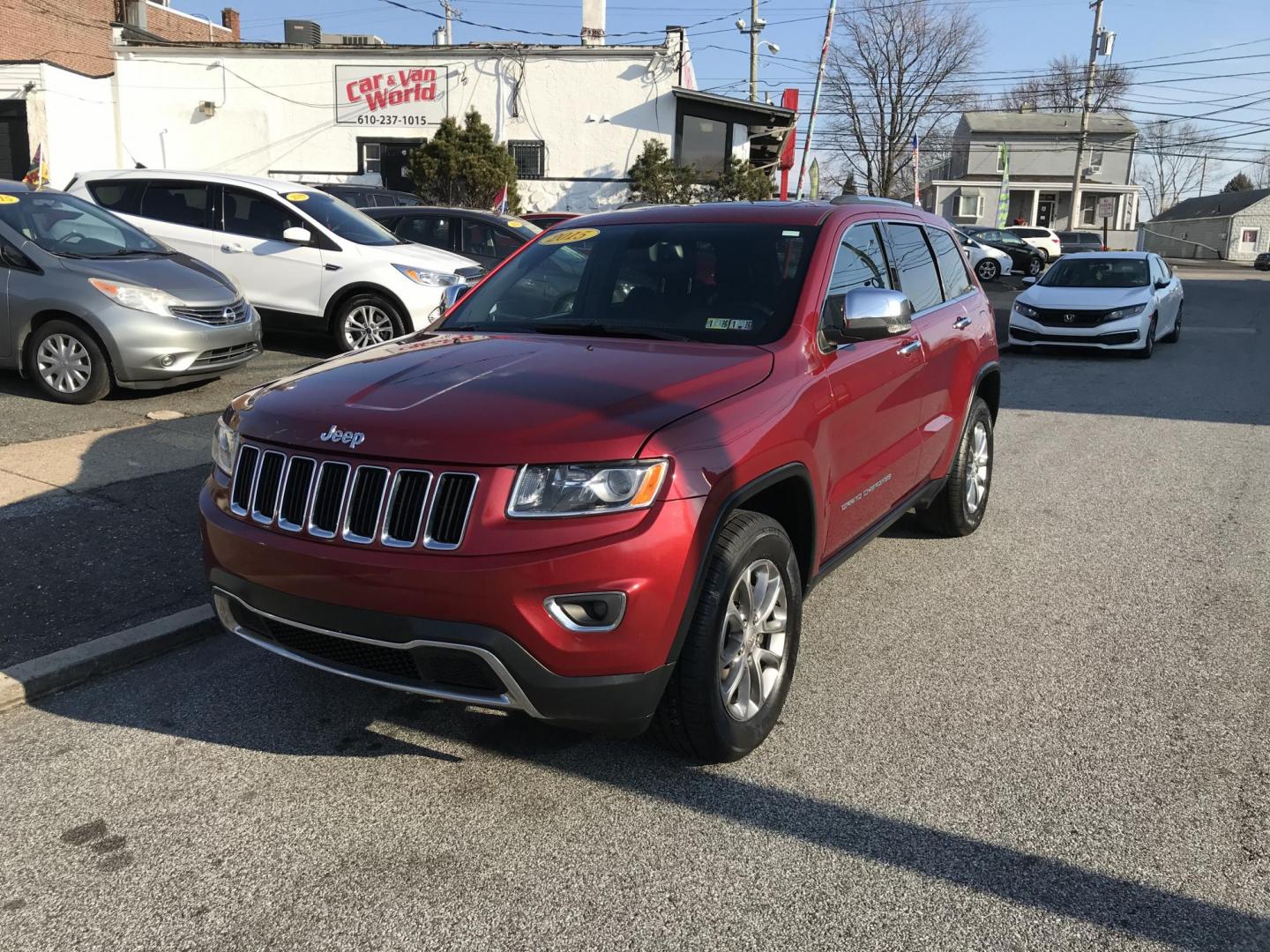 2015 Red /Black Jeep Grand Cherokee Limited 4WD (1C4RJFBGXFC) with an 3.6L V6 DOHC 24V engine, 8-Speed Automatic transmission, located at 577 Chester Pike, Prospect Park, PA, 19076, (610) 237-1015, 39.886154, -75.302338 - Photo#3