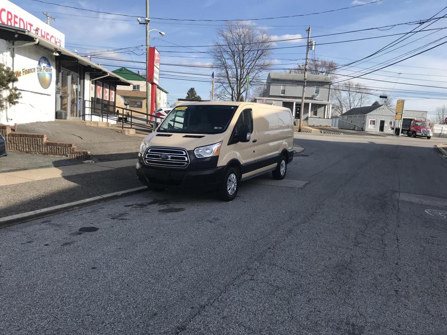 2019 Tan /Gray Ford Transit 150 Van Low Roof w/Sliding Pass. 130-in. WB (1FTYE1YM1KK) with an 3.7L V6 DOHC 24V engine, 6A transmission, located at 577 Chester Pike, Prospect Park, PA, 19076, (610) 237-1015, 39.886154, -75.302338 - 2019 Ford Transit 150 Low Roof: Multiple pieces of shelving, backup camera, fully metal body, partition, FLEET MAINTAINED, looks and runs LIKE NEW! This vehicle comes inspected and has been given a bumper to bumper safety check. It is very clean, reliable, and well maintained. We offer a unique p - Photo#1