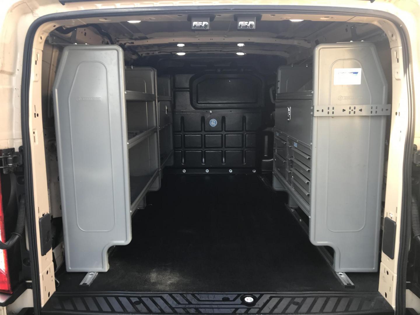 2019 Tan /Gray Ford Transit 150 Van Low Roof w/Sliding Pass. 130-in. WB (1FTYE1YM1KK) with an 3.7L V6 DOHC 24V engine, 6A transmission, located at 577 Chester Pike, Prospect Park, PA, 19076, (610) 237-1015, 39.886154, -75.302338 - 2019 Ford Transit 150 Low Roof: Multiple pieces of shelving, backup camera, fully metal body, partition, FLEET MAINTAINED, looks and runs LIKE NEW! This vehicle comes inspected and has been given a bumper to bumper safety check. It is very clean, reliable, and well maintained. We offer a unique p - Photo#18