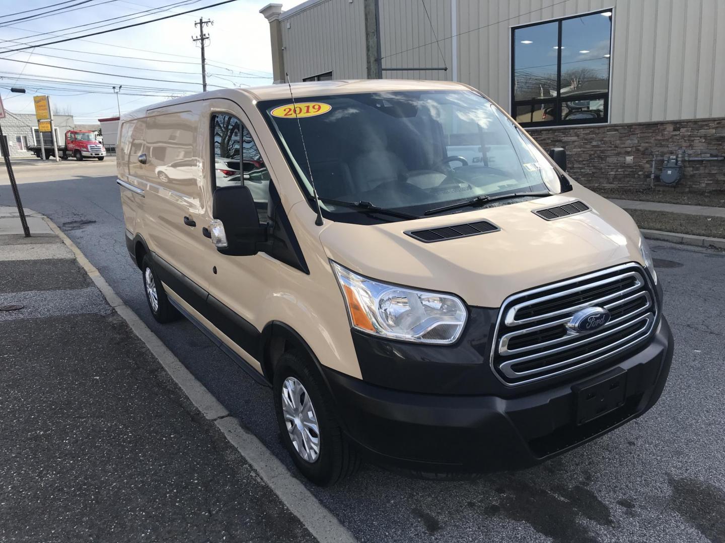 2019 Tan /Gray Ford Transit 150 Van Low Roof w/Sliding Pass. 130-in. WB (1FTYE1YM1KK) with an 3.7L V6 DOHC 24V engine, 6A transmission, located at 577 Chester Pike, Prospect Park, PA, 19076, (610) 237-1015, 39.886154, -75.302338 - 2019 Ford Transit 150 Low Roof: Multiple pieces of shelving, backup camera, fully metal body, partition, FLEET MAINTAINED, looks and runs LIKE NEW! This vehicle comes inspected and has been given a bumper to bumper safety check. It is very clean, reliable, and well maintained. We offer a unique p - Photo#3