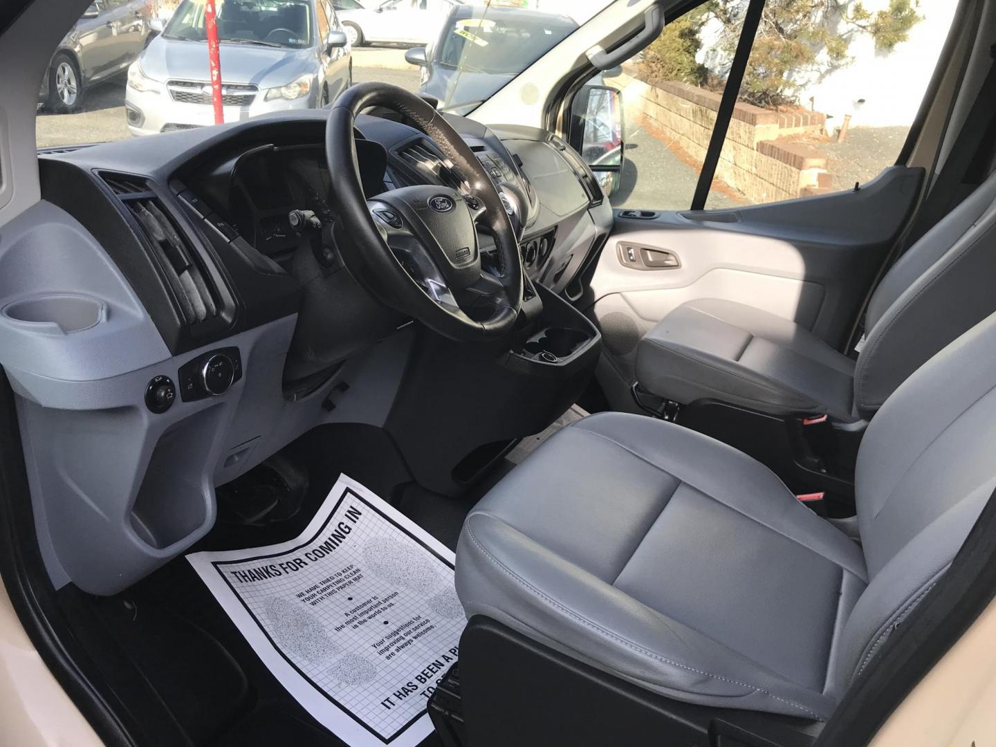 2019 Tan /Gray Ford Transit 150 Van Low Roof w/Sliding Pass. 130-in. WB (1FTYE1YM1KK) with an 3.7L V6 DOHC 24V engine, 6A transmission, located at 577 Chester Pike, Prospect Park, PA, 19076, (610) 237-1015, 39.886154, -75.302338 - 2019 Ford Transit 150 Low Roof: Multiple pieces of shelving, backup camera, fully metal body, partition, FLEET MAINTAINED, looks and runs LIKE NEW! This vehicle comes inspected and has been given a bumper to bumper safety check. It is very clean, reliable, and well maintained. We offer a unique p - Photo#7